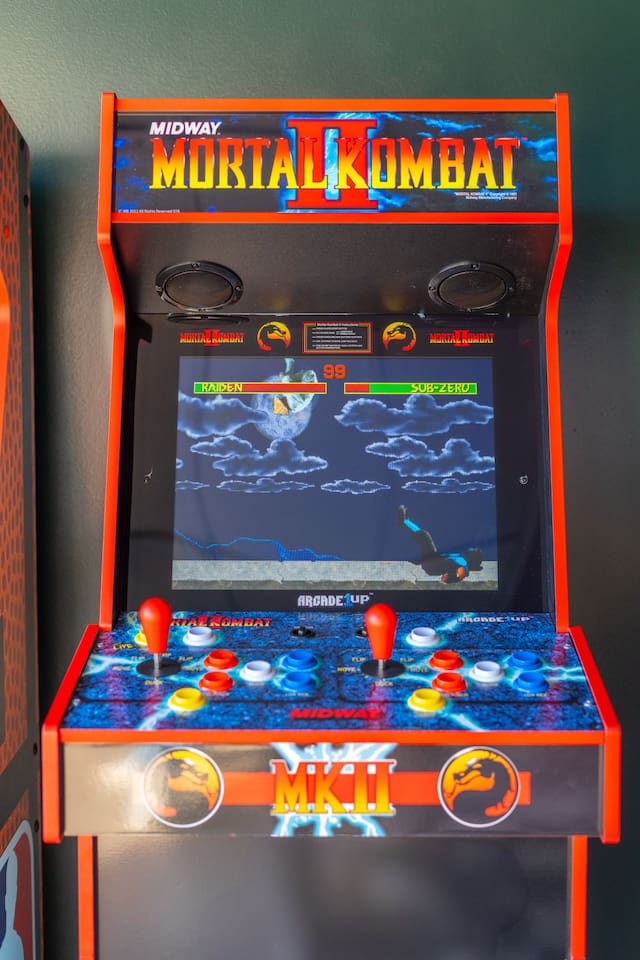 Arcade Throwback Fun  – Relive the excitement with a classic Mortal Kombat II arcade machine.