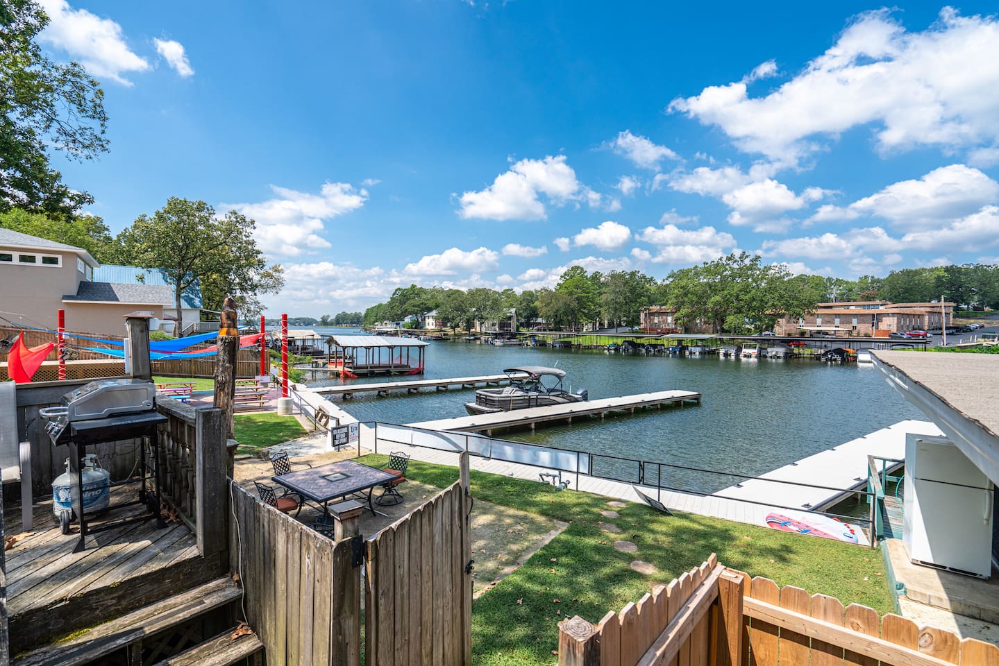 Patio Paradise: Enjoy stunning lake views and sunshine, perfect for evening grill sessions!