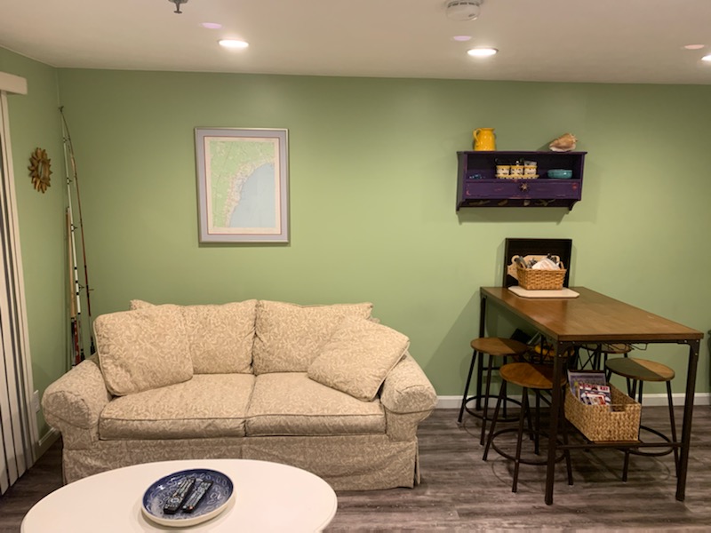 Another angle of the sleeper sofa in the living room space.