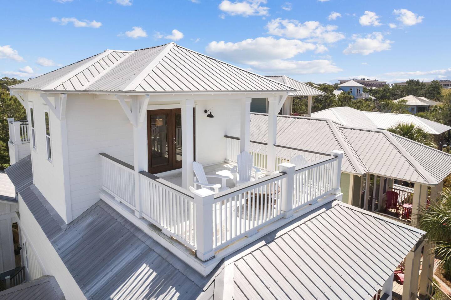 3rd floor balcony overlooks neighborhood.