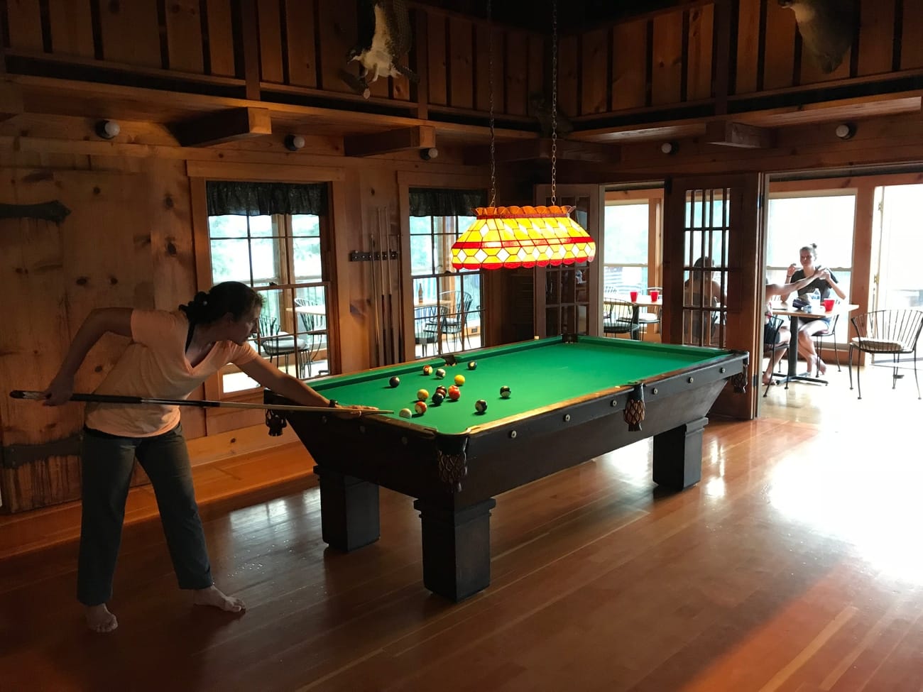 Pool table and game room inside The Lodge at Palmer Lake