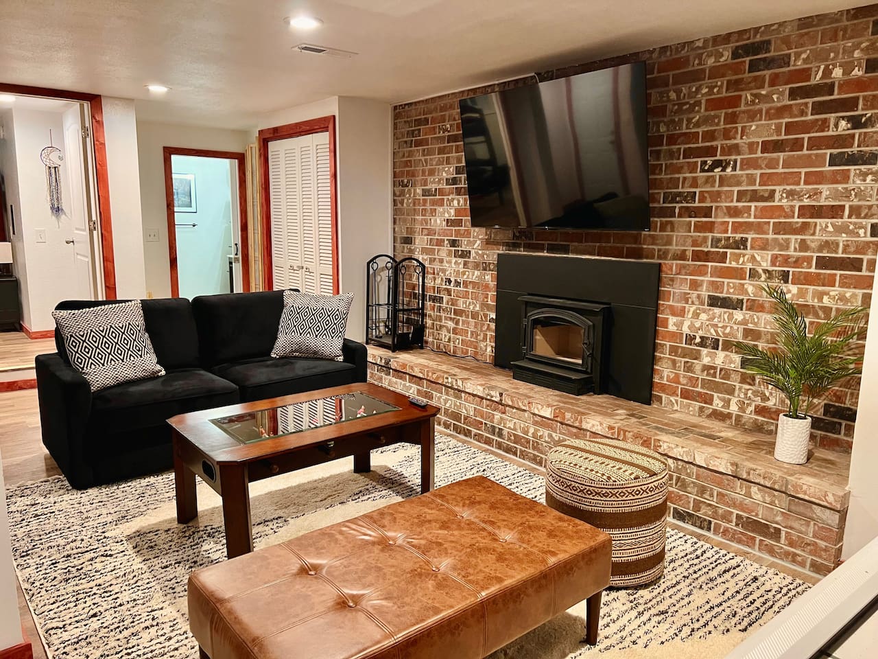 Lower Floor level game room with wood burning fireplace.