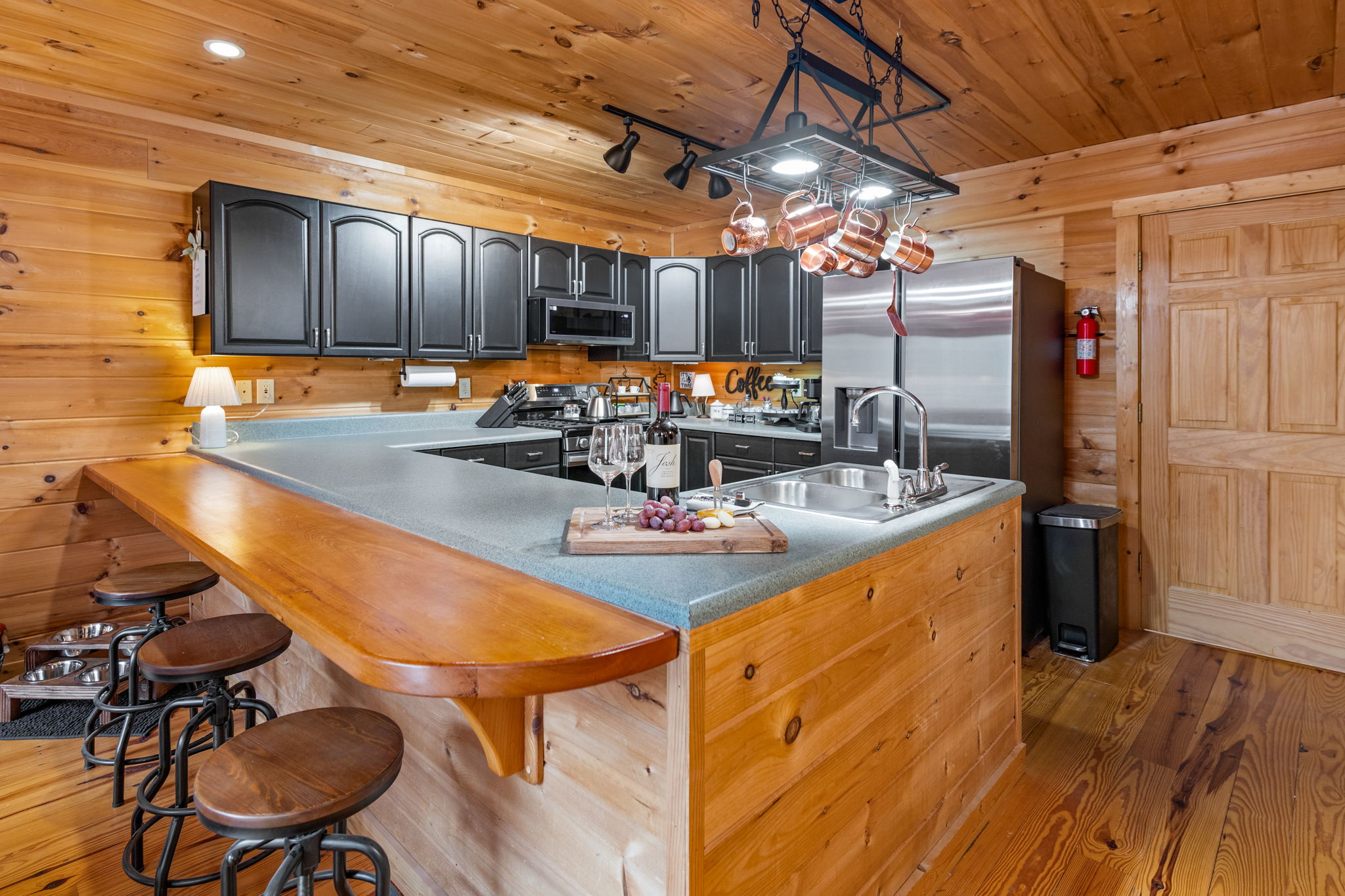 The kitchen features a complete setup with everything you need to prepare meals with ease.