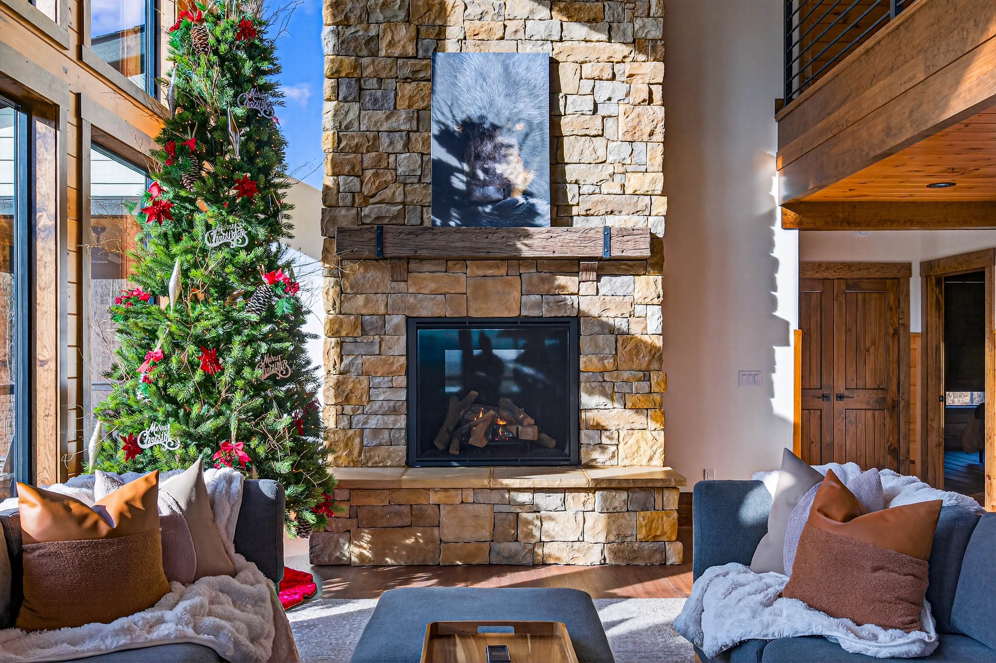 Gather around the twinkling Christmas tree and enjoy the warmth of the Smokies. This inviting living space is the perfect backdrop for holiday memories, family traditions, and cozy winter evenings.