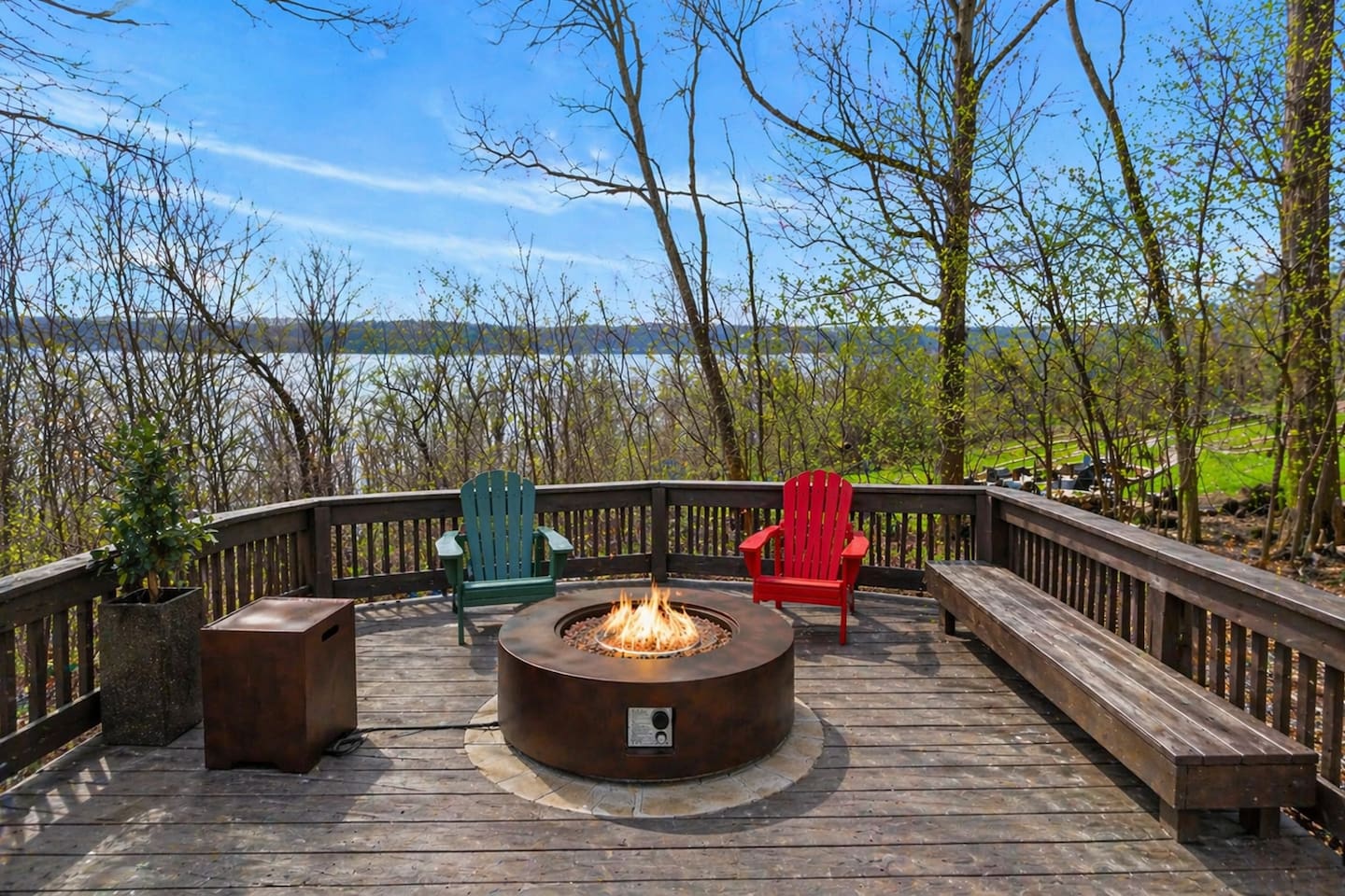 Gather around the outdoor fire pit with Adirondack chairs and bench seating—enjoy cozy evenings, roast marshmallows, and take in peaceful lake views surrounded by nature, making it the perfect spot for relaxing and creating unforgettable memories