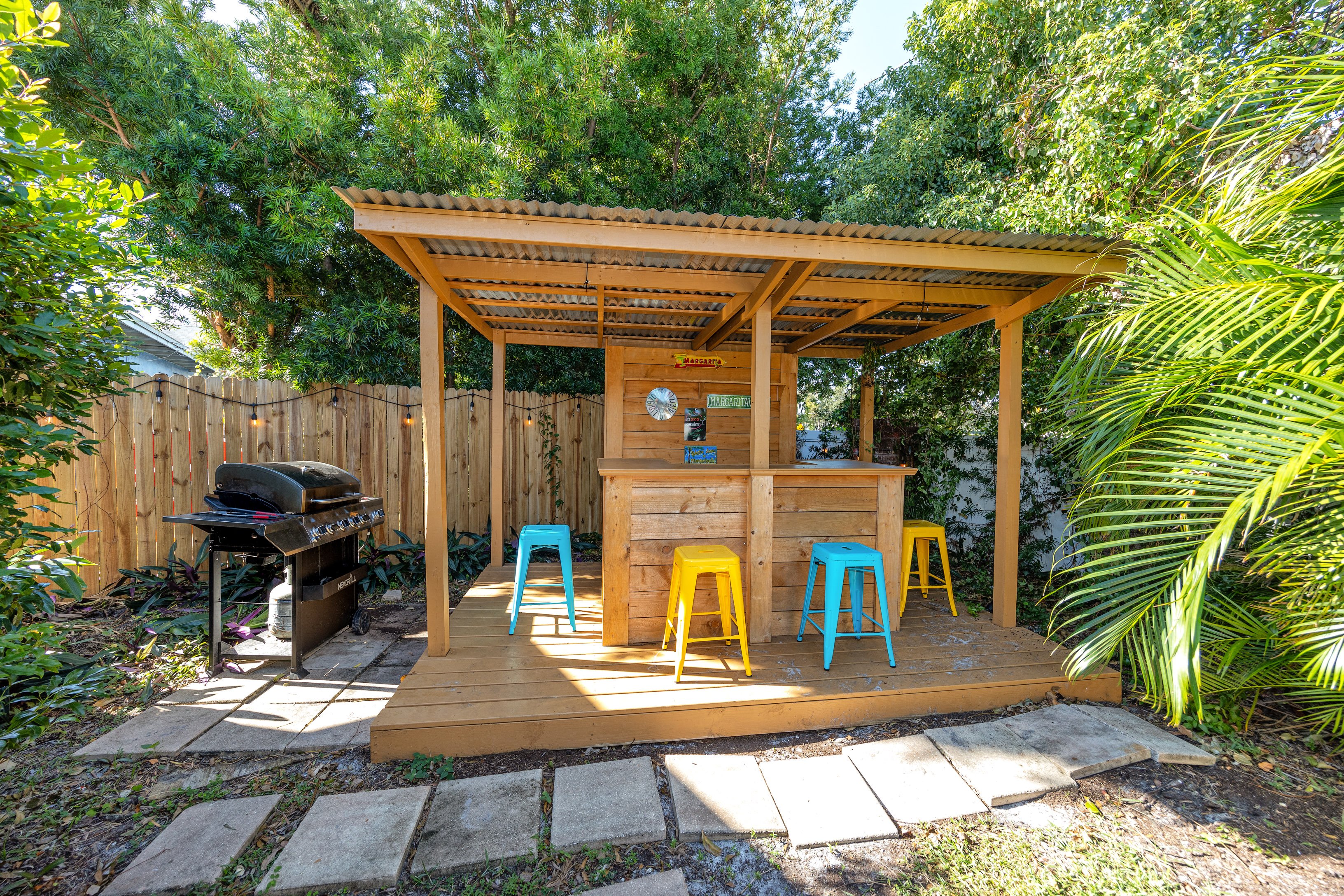 "The spacious backyard and the tiki bar are great places to hangout and enjoy some downtime."