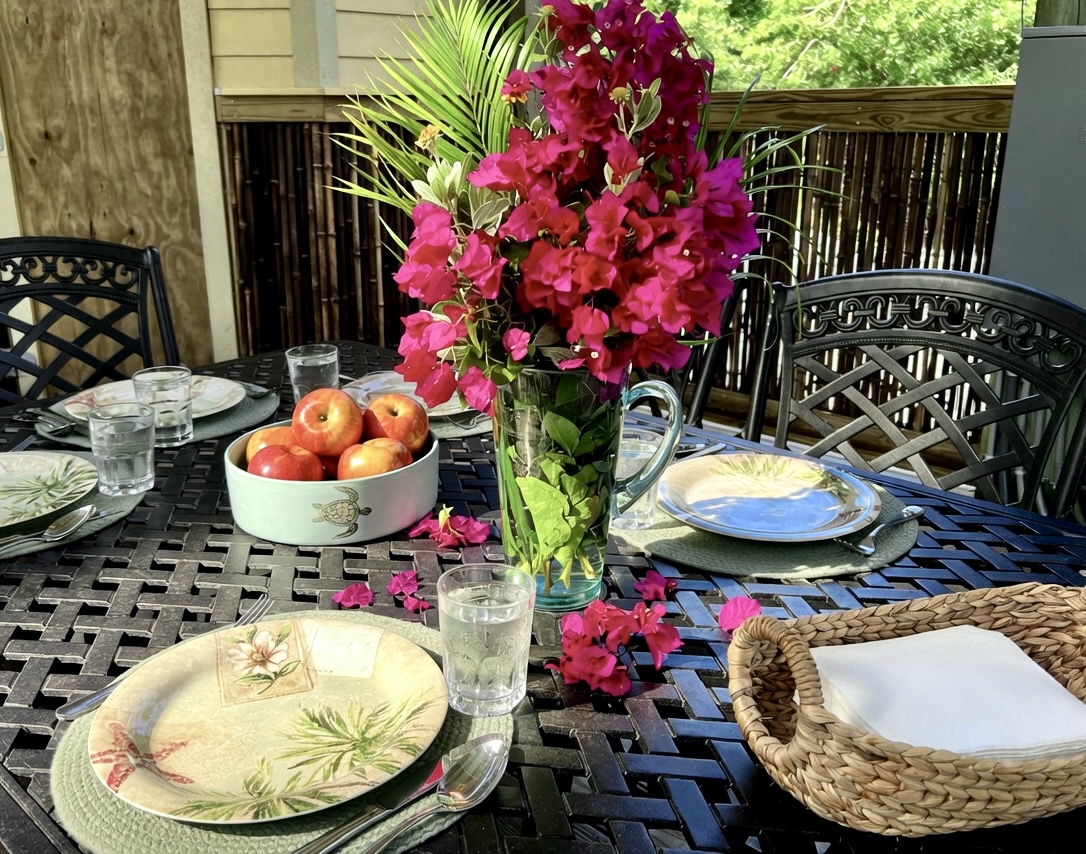 Grill, plate, sit - the outdoor grill zone is steps from the table, creating an open-air kitchen with the bar just an arm's reach away.