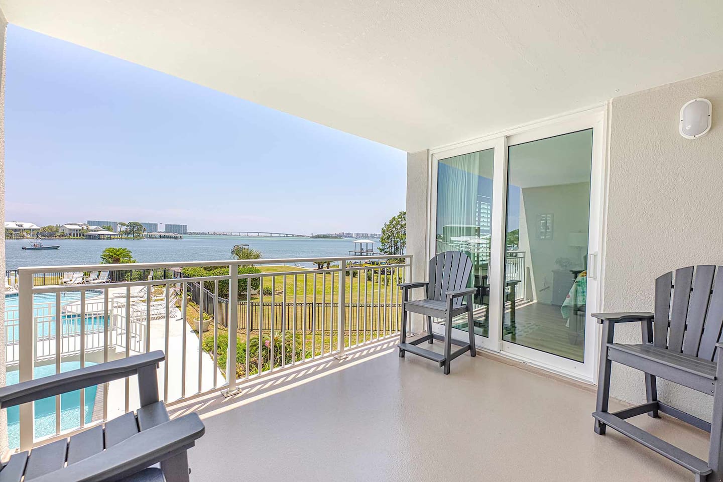 Balcony Bliss: Sip drinks on the balcony with stunning views of the serene waterfront!