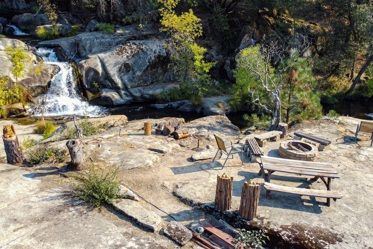Firepit by the river. Restrictions apply.
