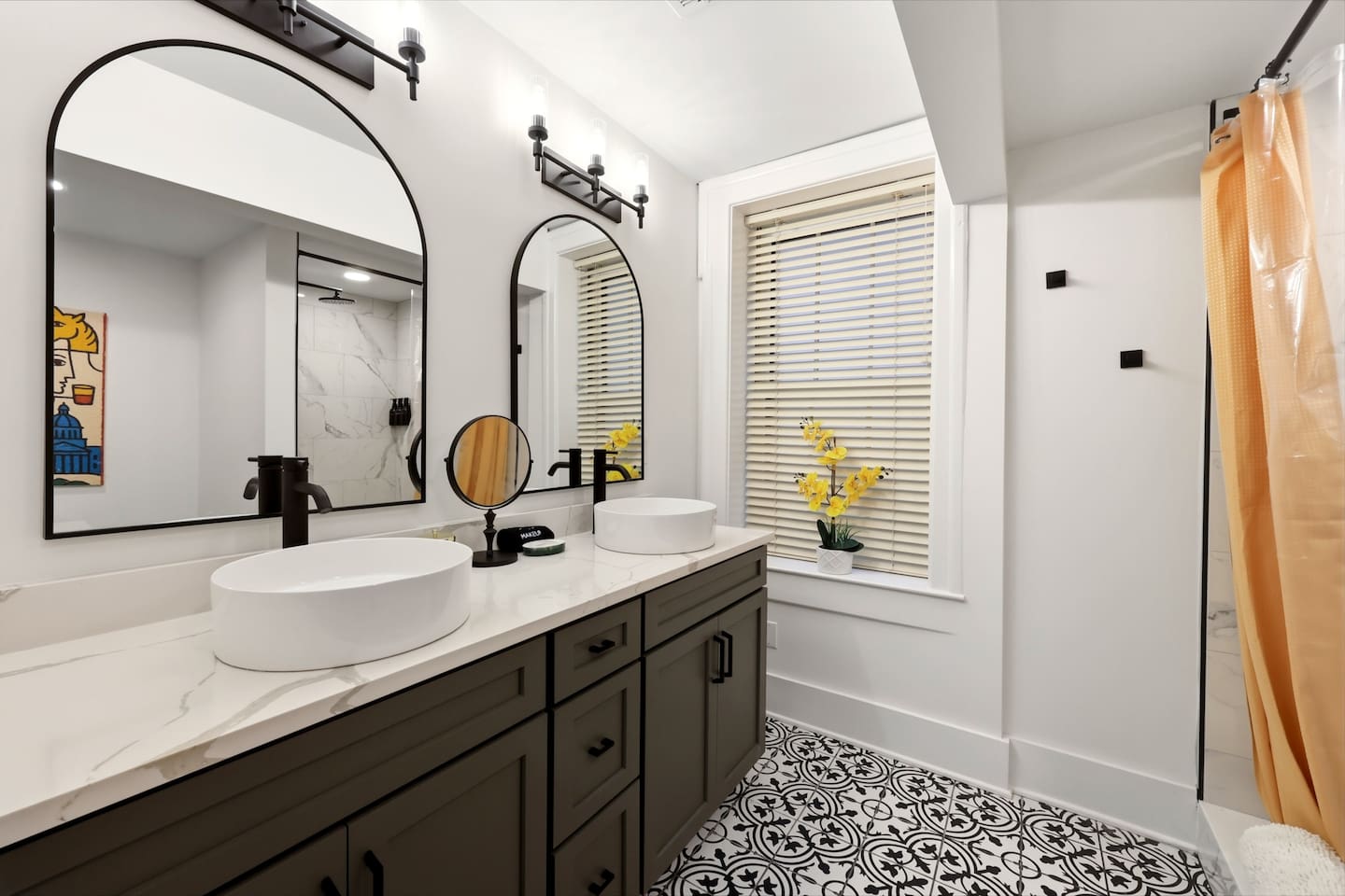 Newly remodeled bathroom with double vanity.