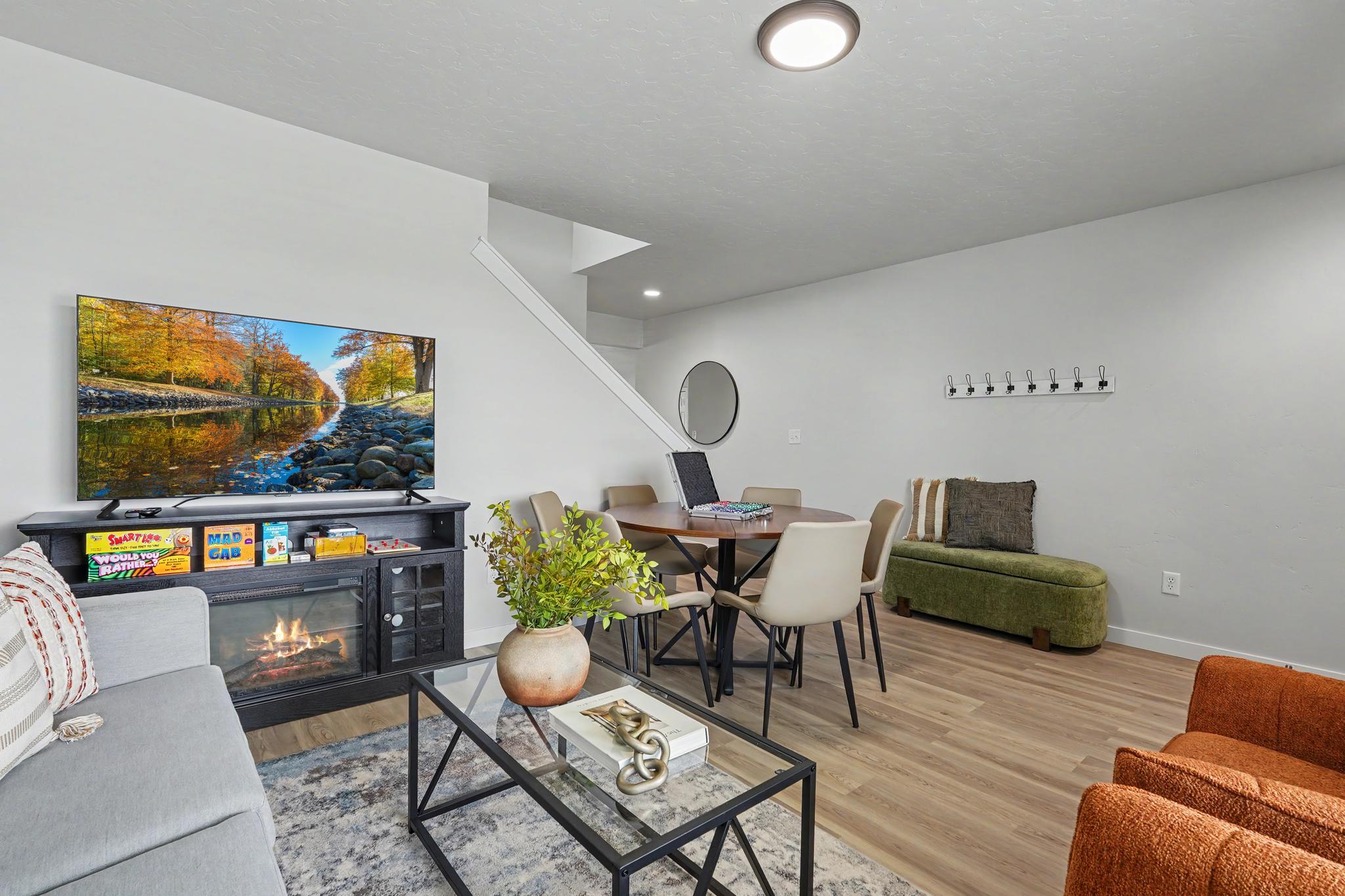 The front living room features a cozy gas fireplace, creating the perfect atmosphere for relaxing, visiting, and enjoying quality time together.