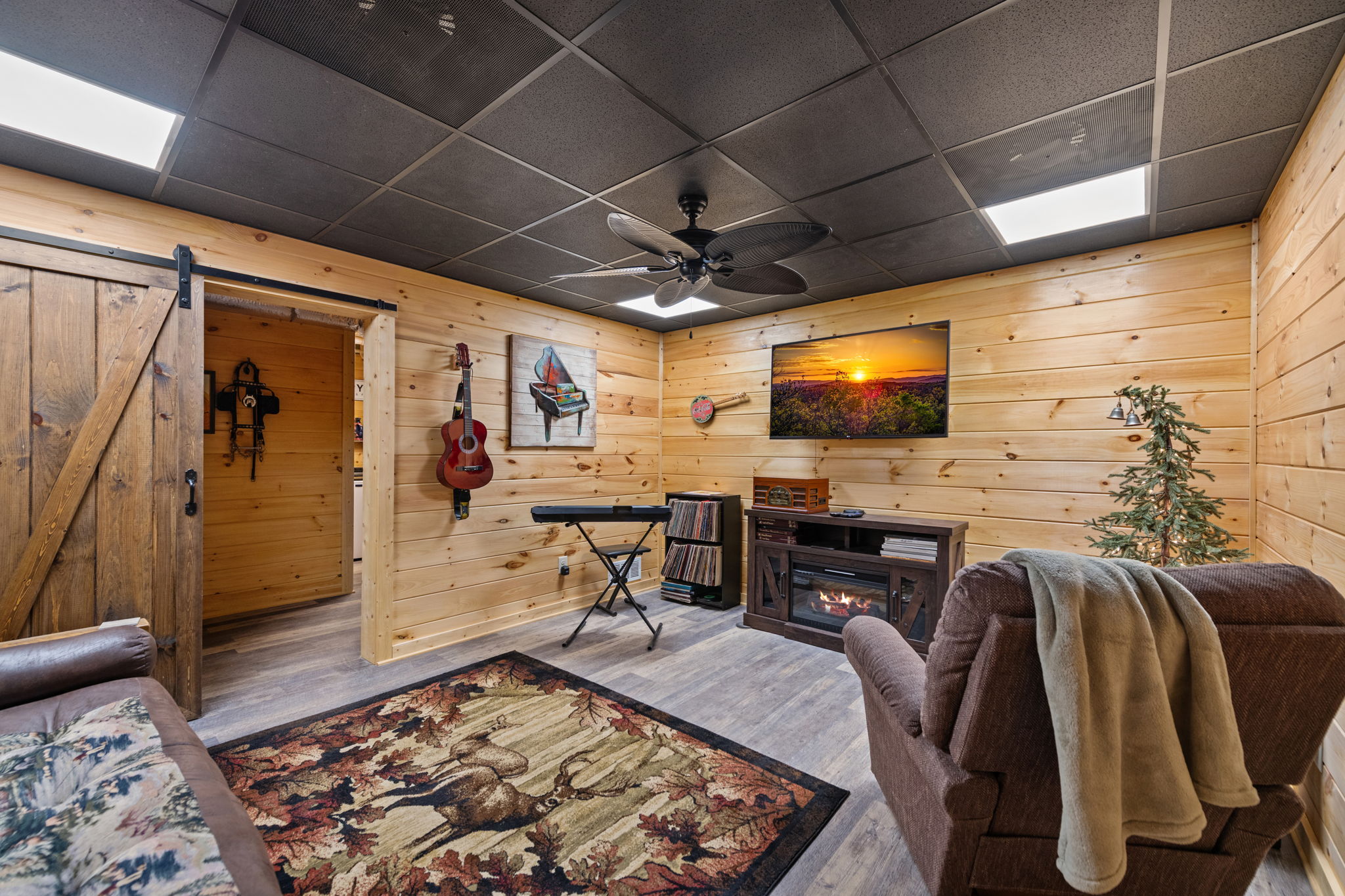 A music lounge located in the basement provides a private and comfortable space to relax and unwind