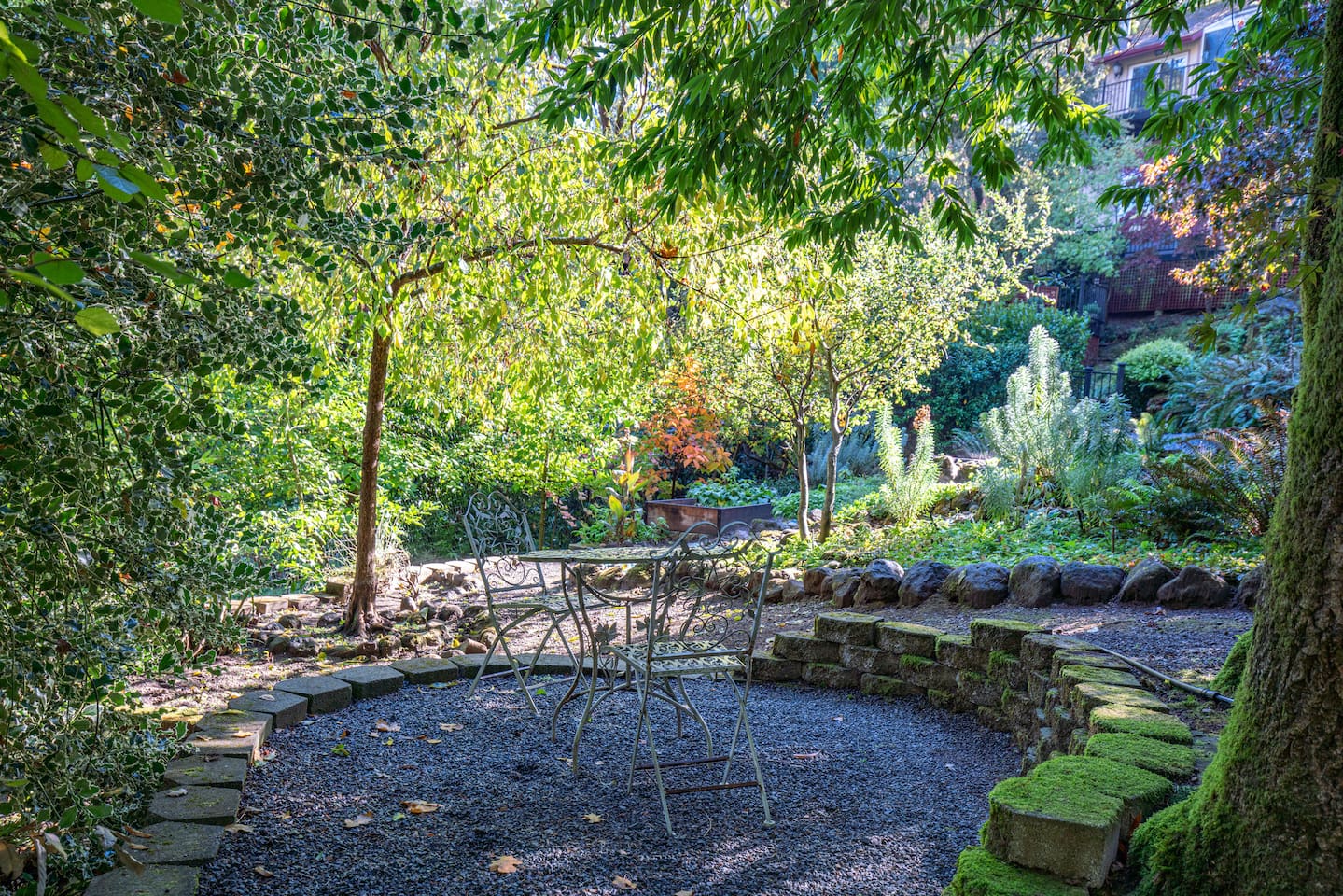 Relax in the midst of a beautiful garden with our comfortable outdoor seating.