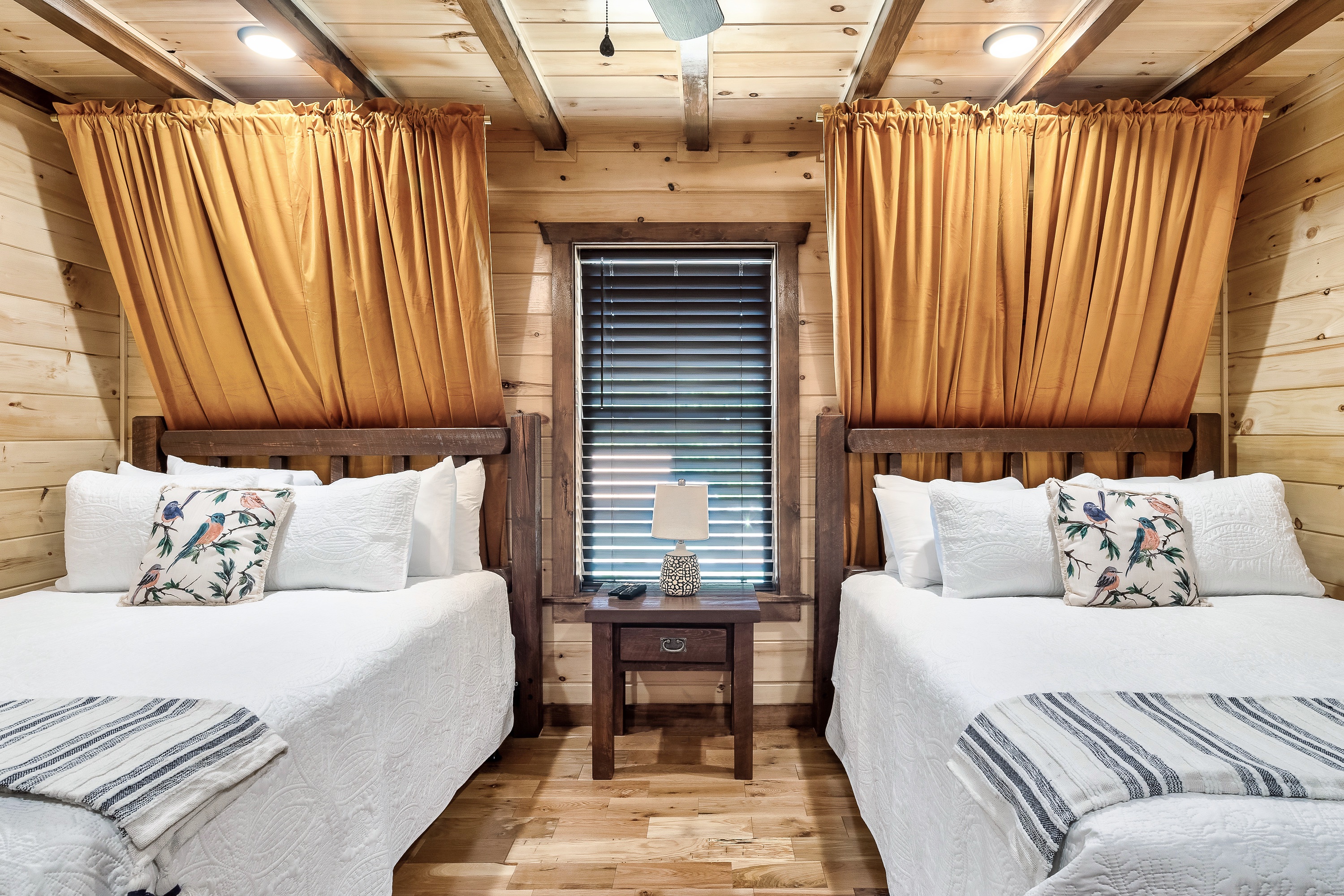 The Gold bedroom (downstairs) has 2 queen beds and a private bathroom