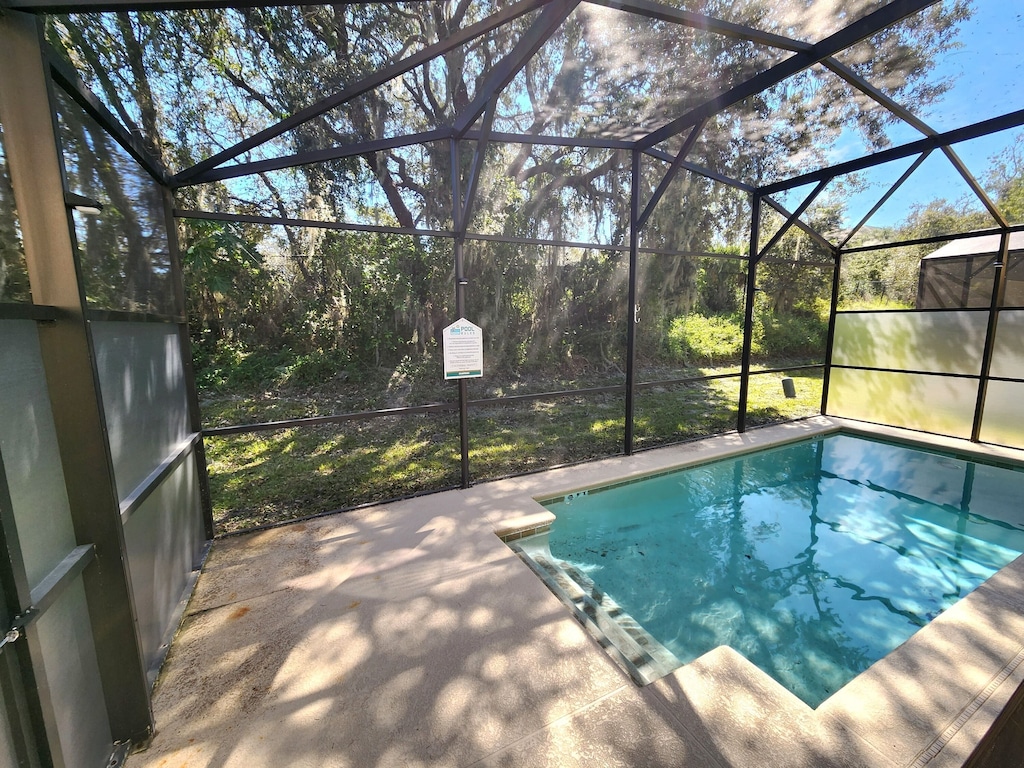 private, screened in Pool area, conservation View