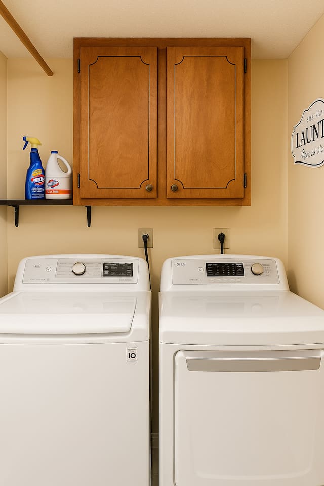 In-home laundry cabinet includes supplies and storage — ready for long stays or weekend refreshes.