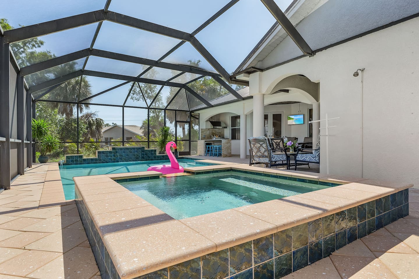 Dive into the inviting crystal clear pool & spa for endless fun and relaxation!