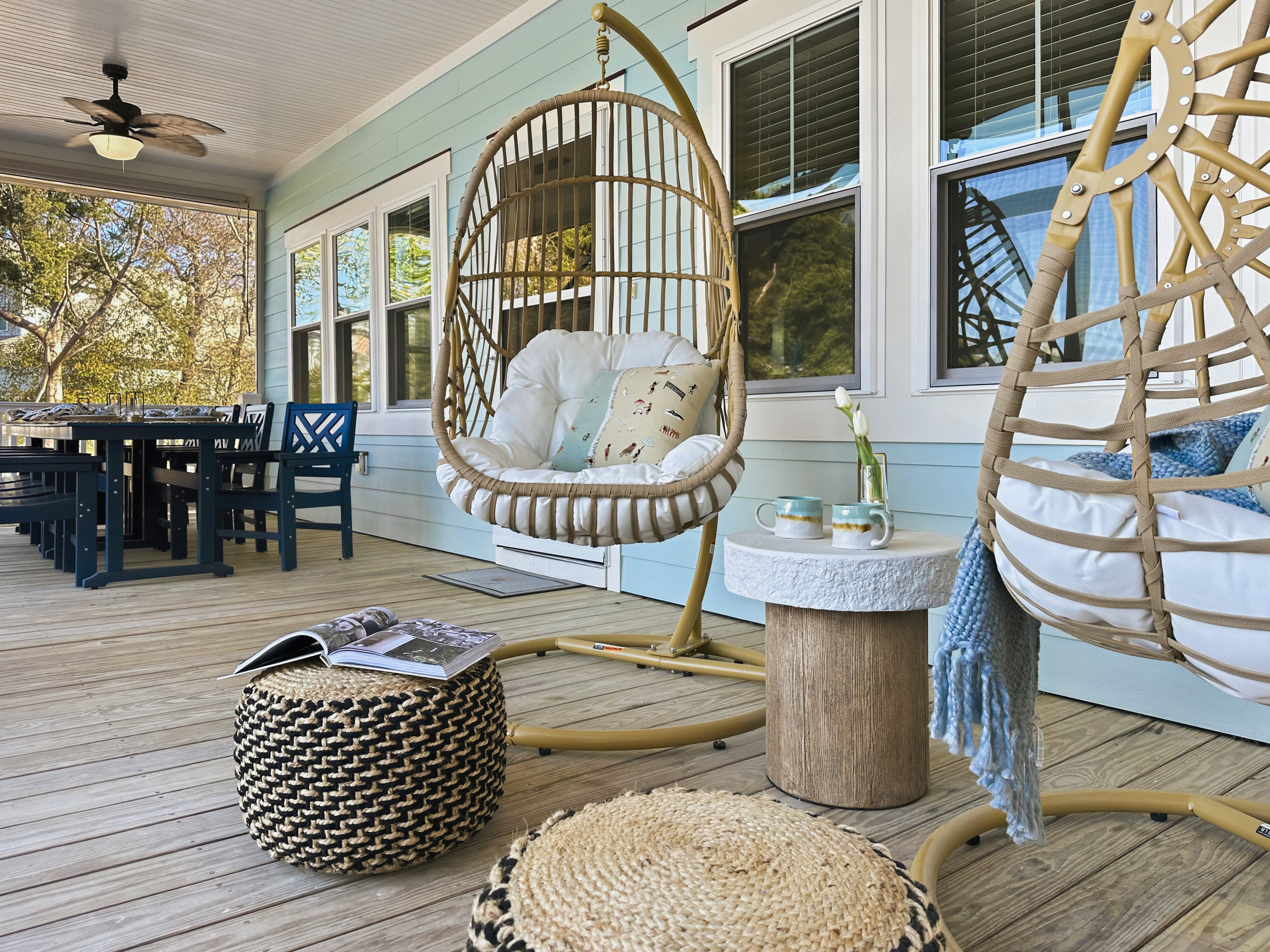 The porch also has 2 swing chairs.