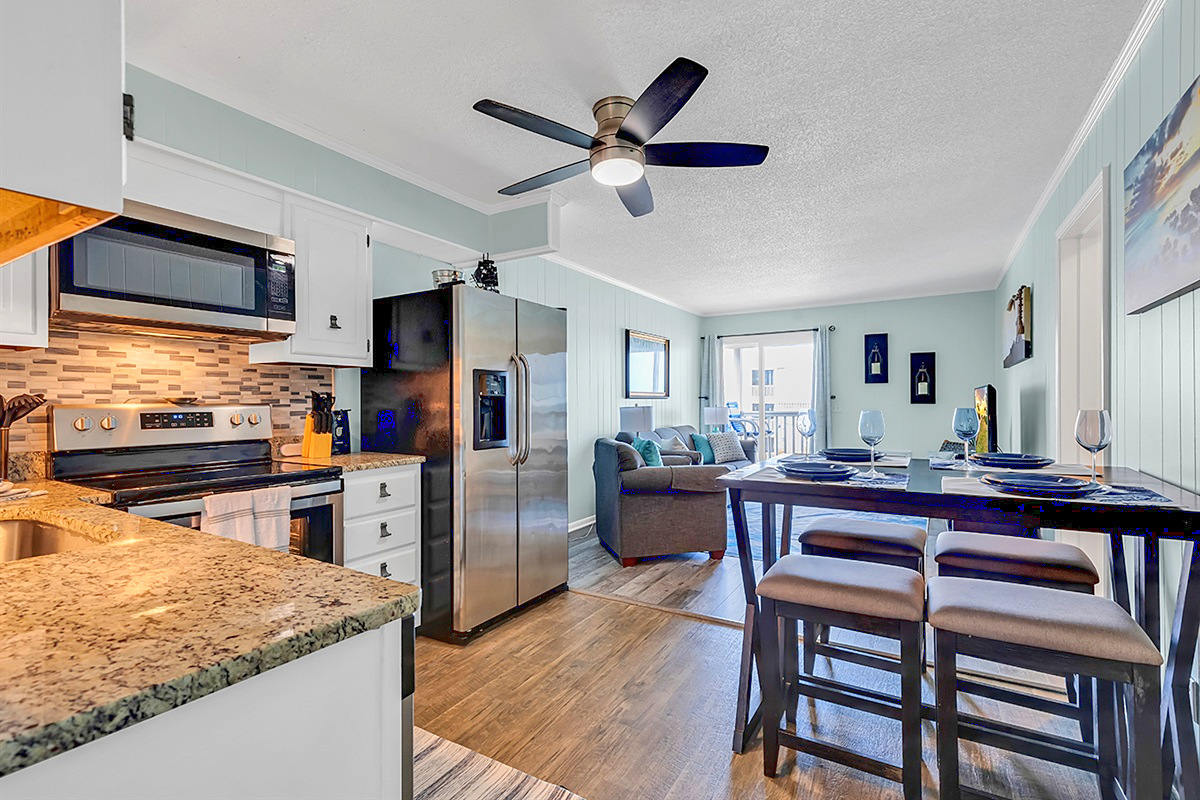 Kitchen – Open layout flows into the dining and living areas