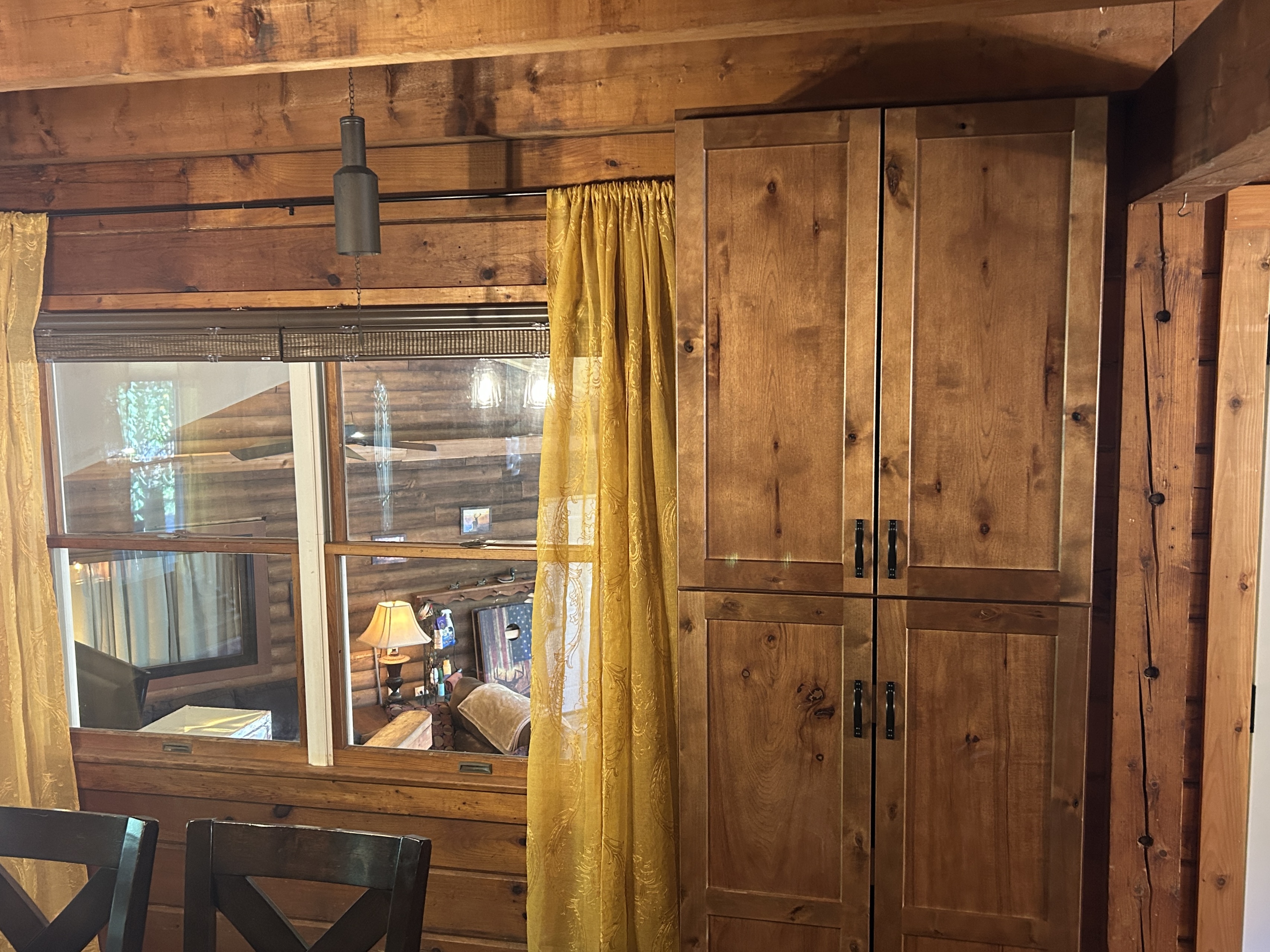 View from Cabin dining room window into Sunroom.