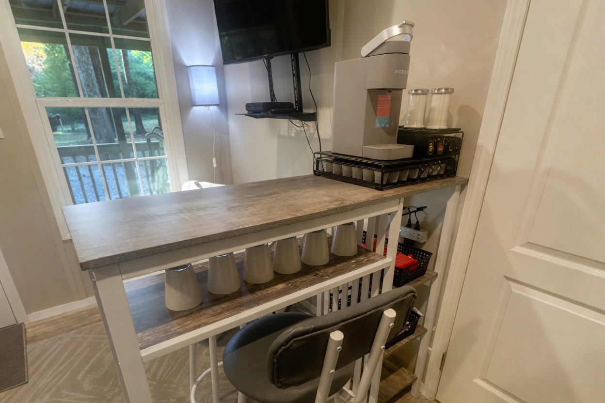 Dining table with 2 chairs and coffee bar
