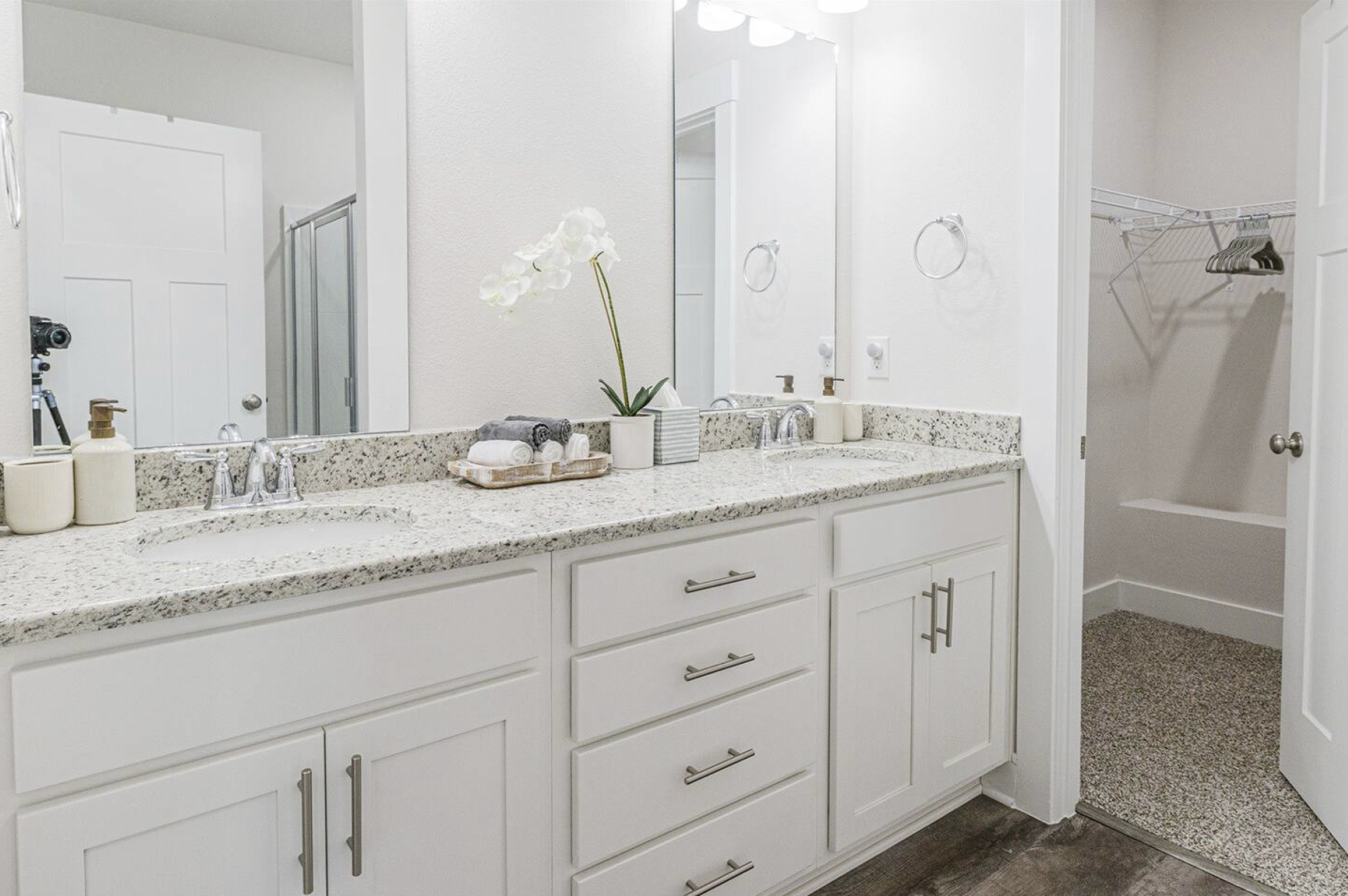 Third full bathroom, shared between the third and fourth bedrooms on the second floor