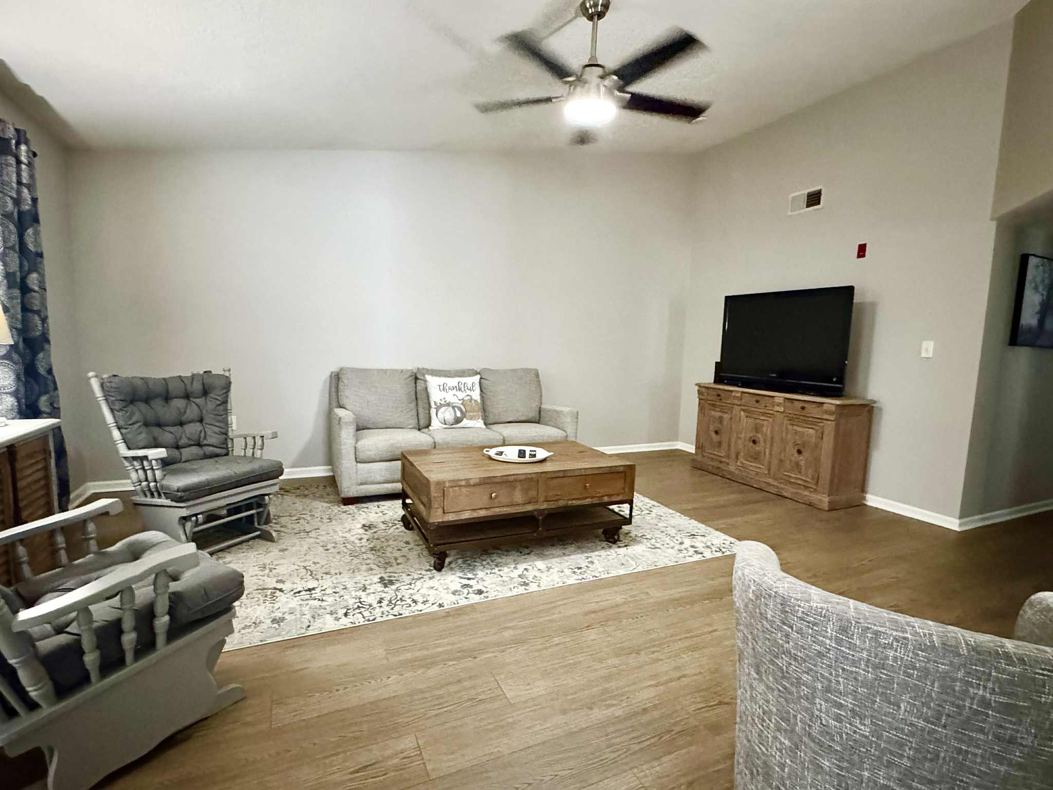 Queen Sleeper Sofa In Living room with flat screen smart tv