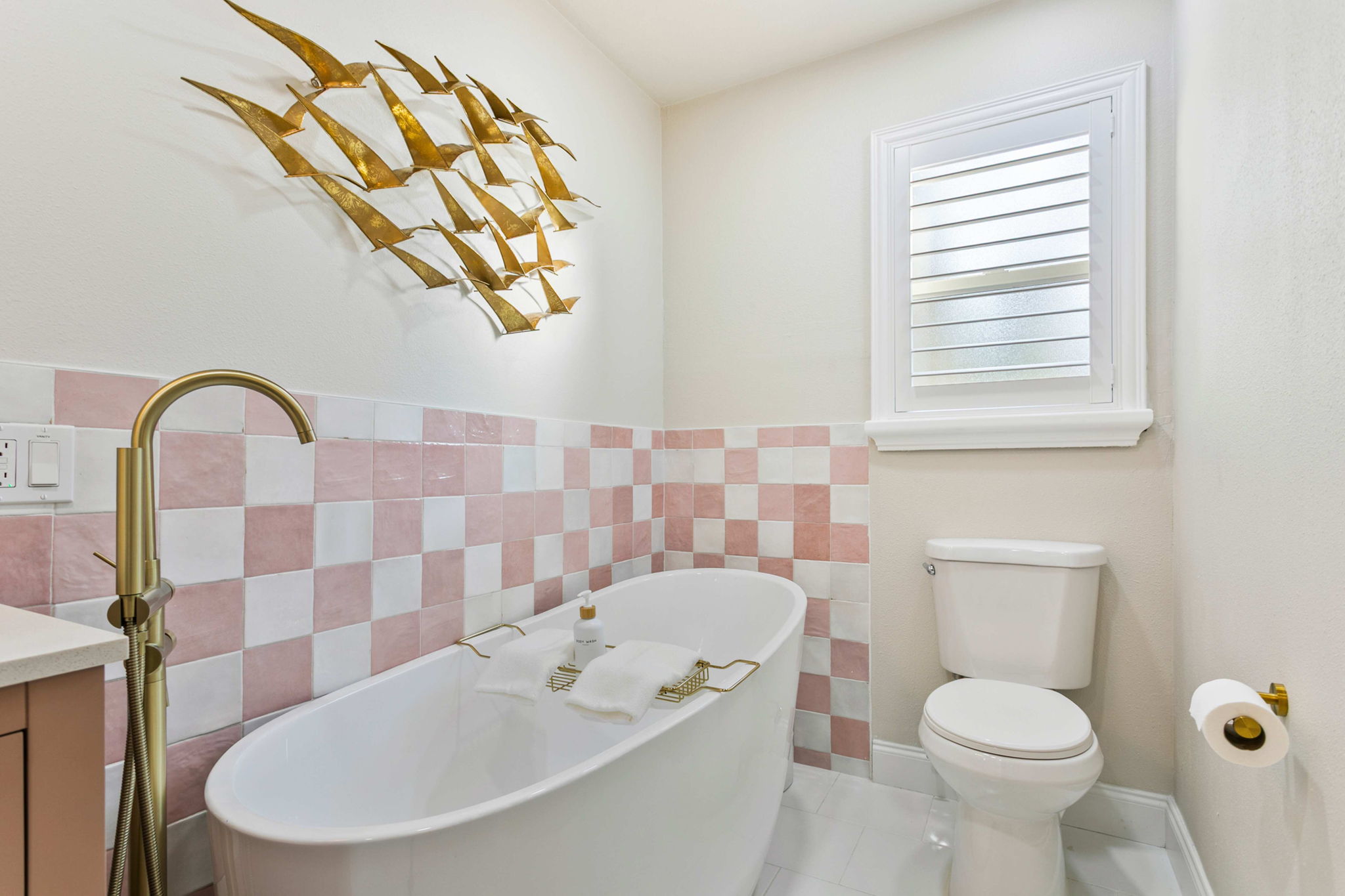 Master bathroom with glass shower and a separate soaking tub