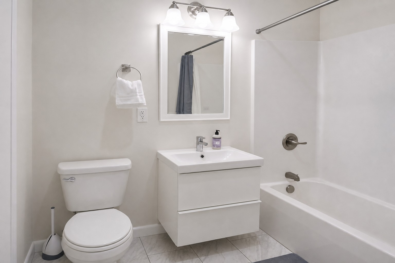 Master bathroom with tub and shower