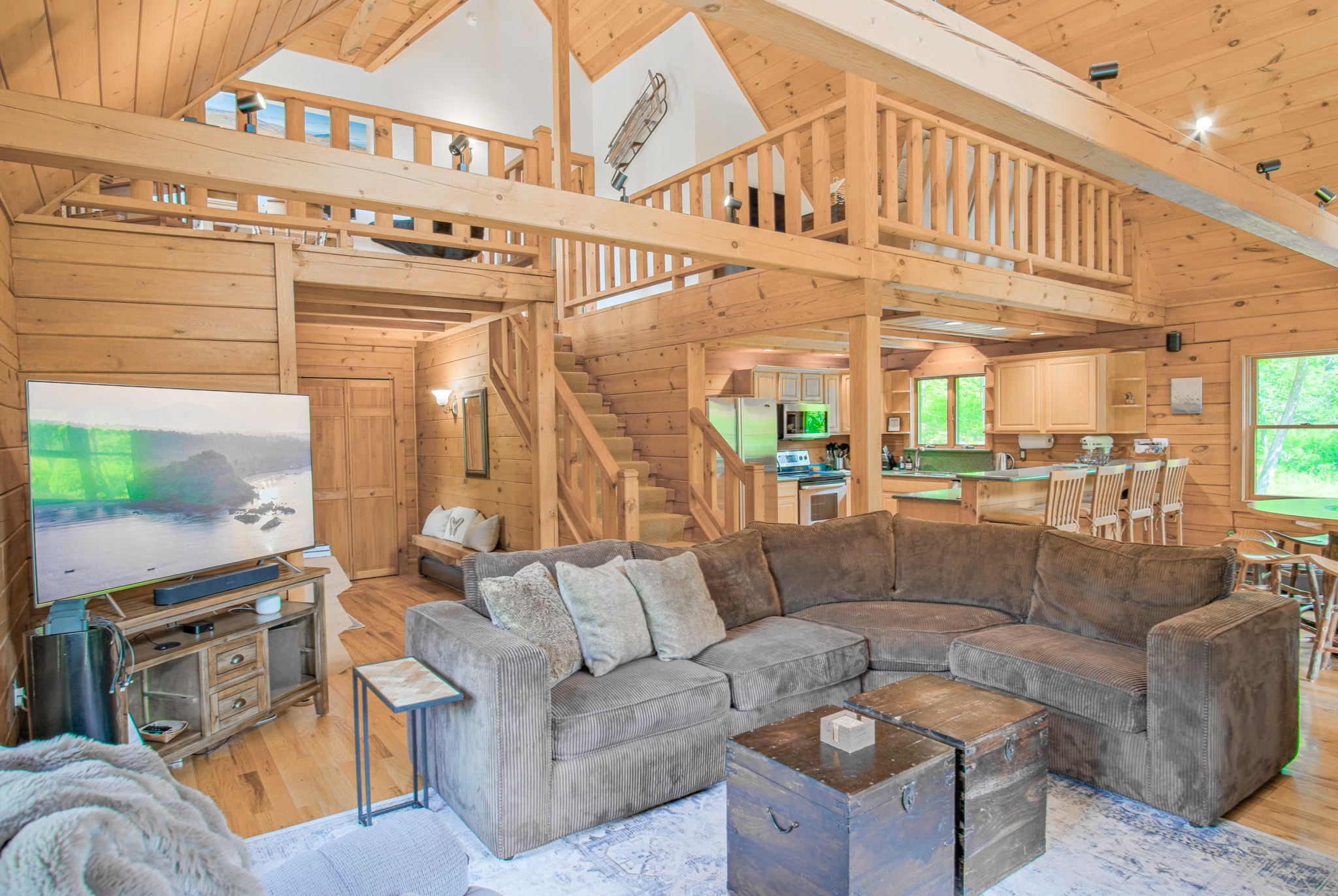 Our 22ft cathedral ceiling offers the most luxurious feel. Discover the warmth of an authentic log-home chalet interior.