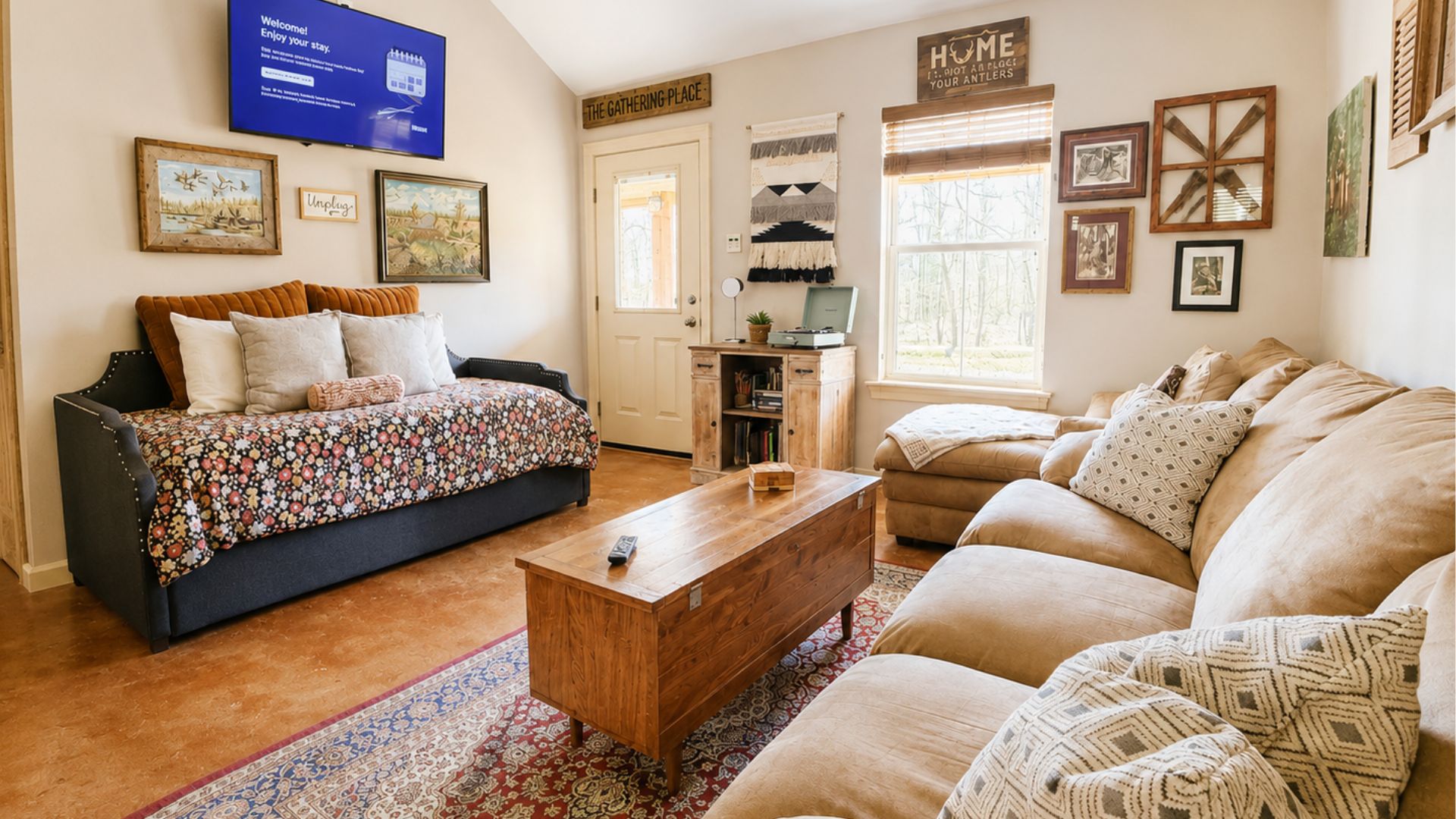 The Gathering Room is where camp conversations turn into core memories. Open to the kitchen and dining room, this cozy space keeps everyone connected whether you’re cooking dinner, watching the game or playing on the chalkboard wall.
