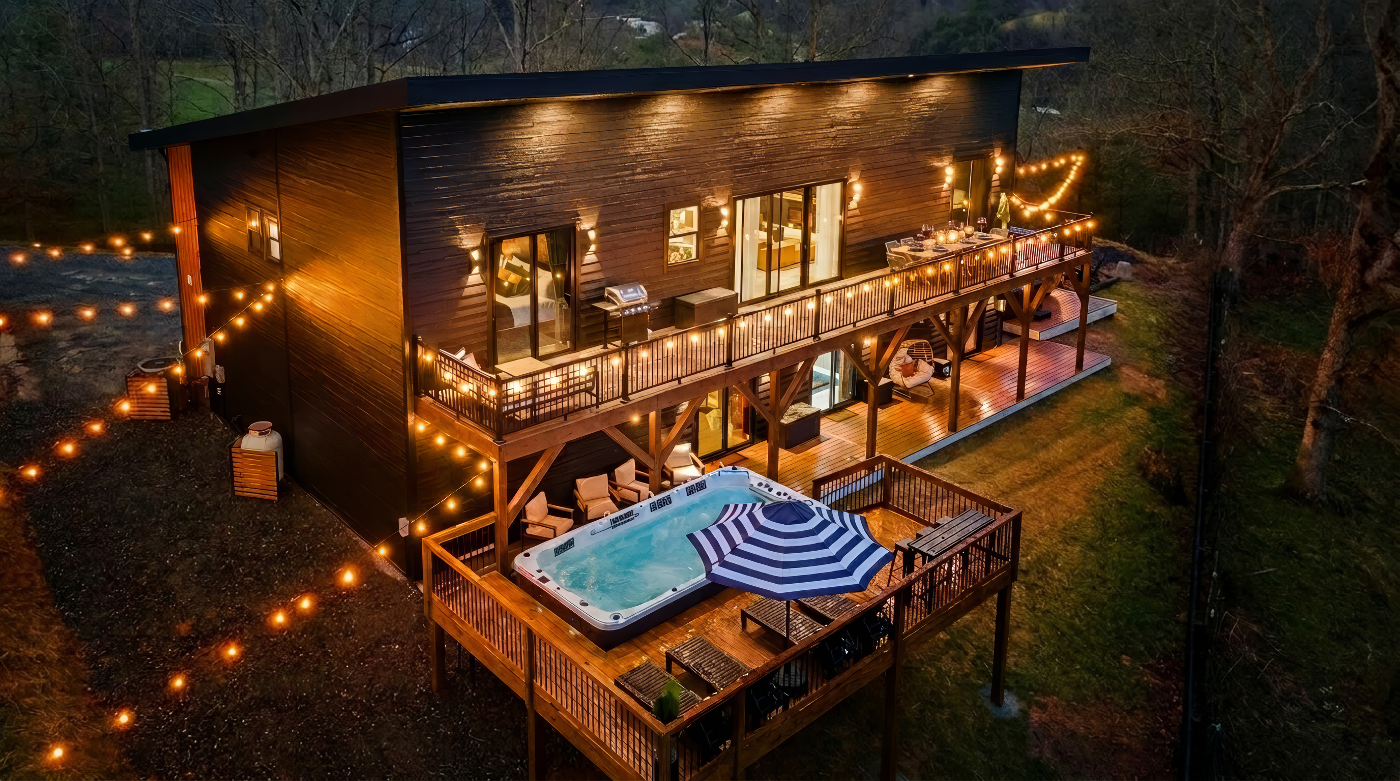 {Summit House} Welcome to Summit House — a modern speakeasy estate for up to 20 guests. Enjoy panoramic Blue Ridge views, a hot tub, sauna, fire pit lounge, and expansive indoor-outdoor spaces designed for gathering, celebrating, and unwinding in style.