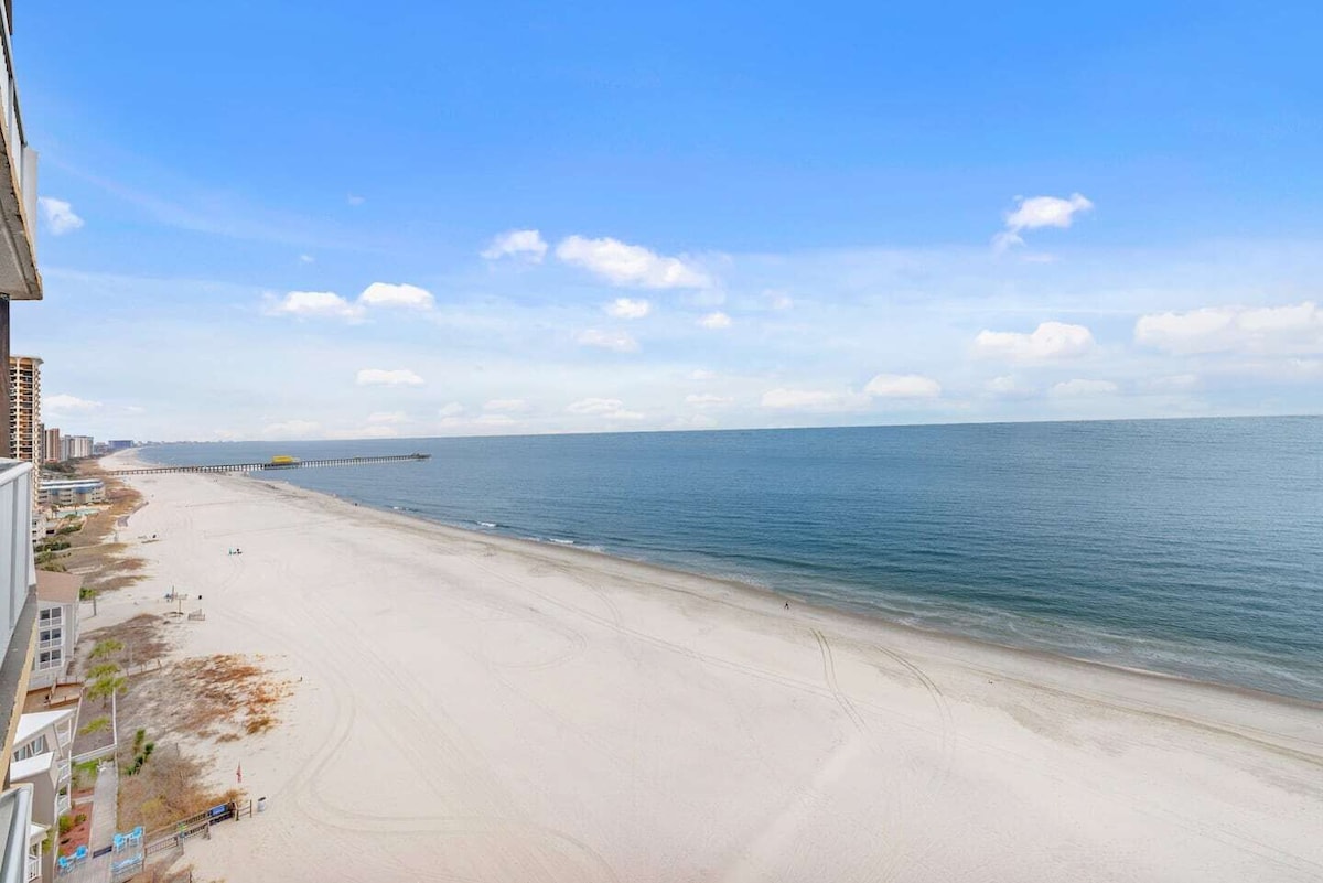 This incredible end-unit features expansive ocean views from both the master bedroom and the living room.