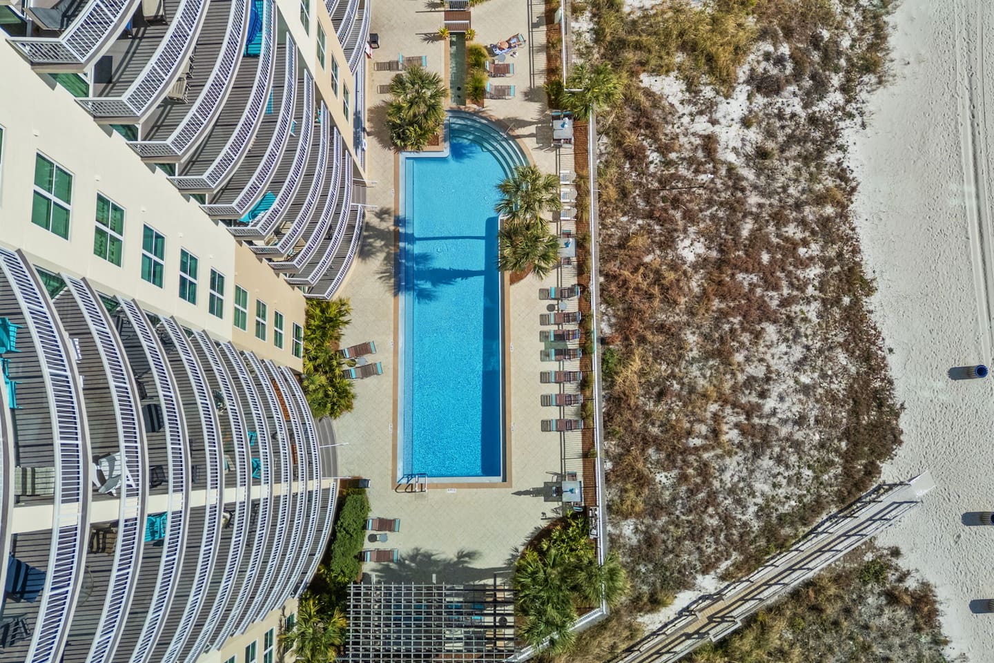 Aqua Resort has 2 pools, one indoor/outdoor pool that is seasonally heated inside and another outdoor only pool. This is the outdoor pool, looking down on it from Bleu No. 1809 18th story balcony.