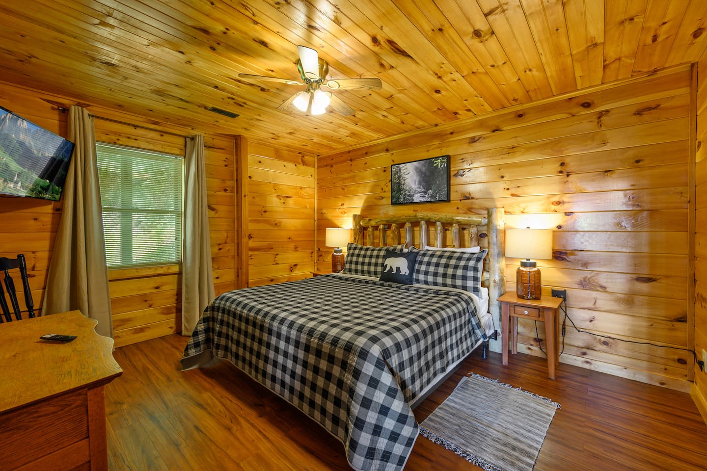 The lower floor bedroom has a comfortable king size and direct access to the shared full bathroom. 