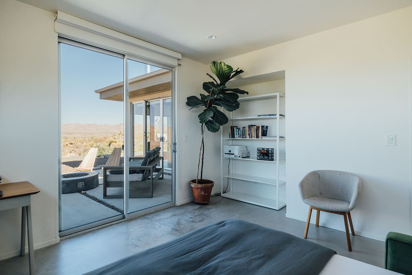 Wake up to mountain views and step outside through sliding doors that connect directly to the side patio.
