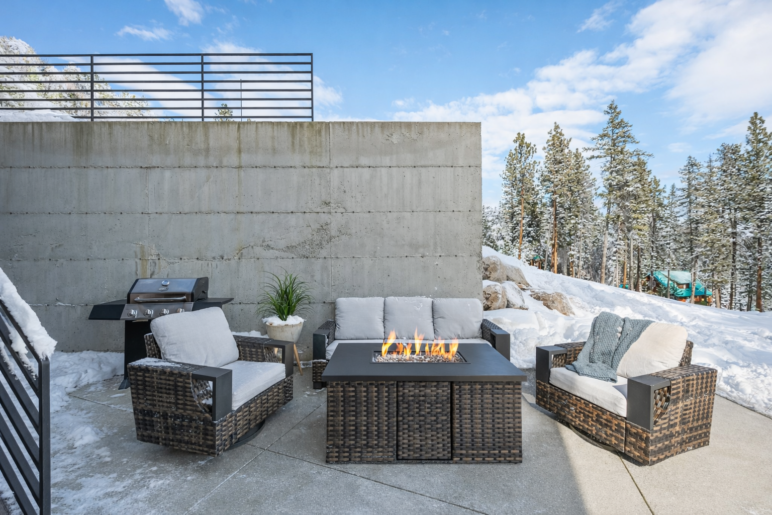 Winter vibes: Outdoor lounge seating with fire table, rocking chairs, BBQ grill (propane provided)