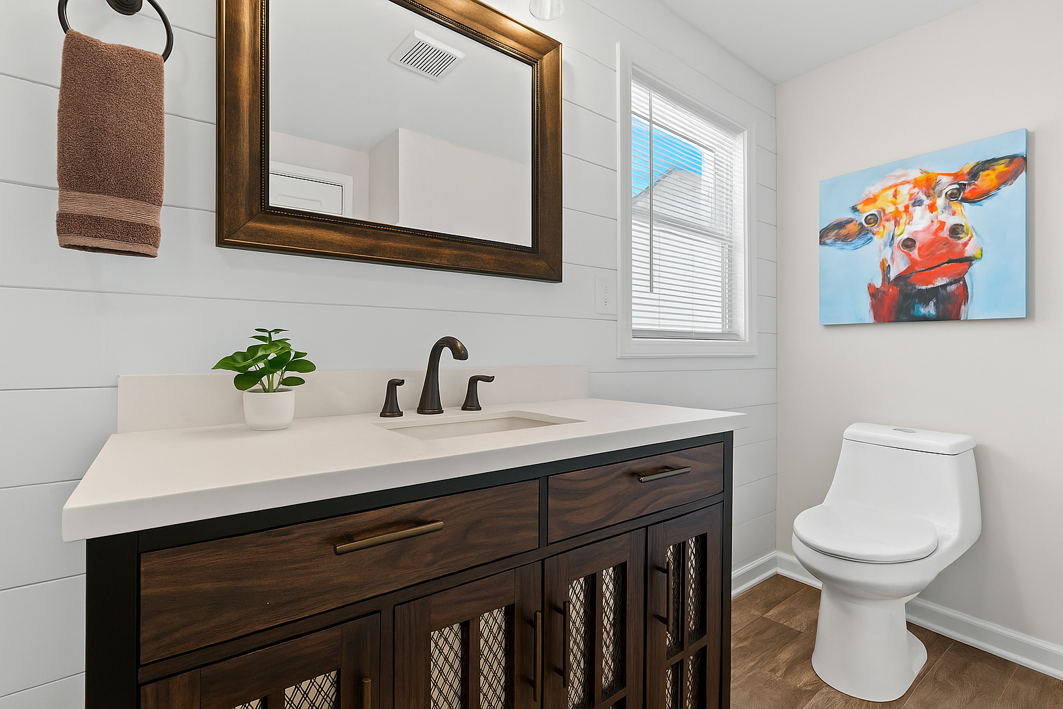 Bright, modern bathroom with farmhouse charm and a playful touch of personality.