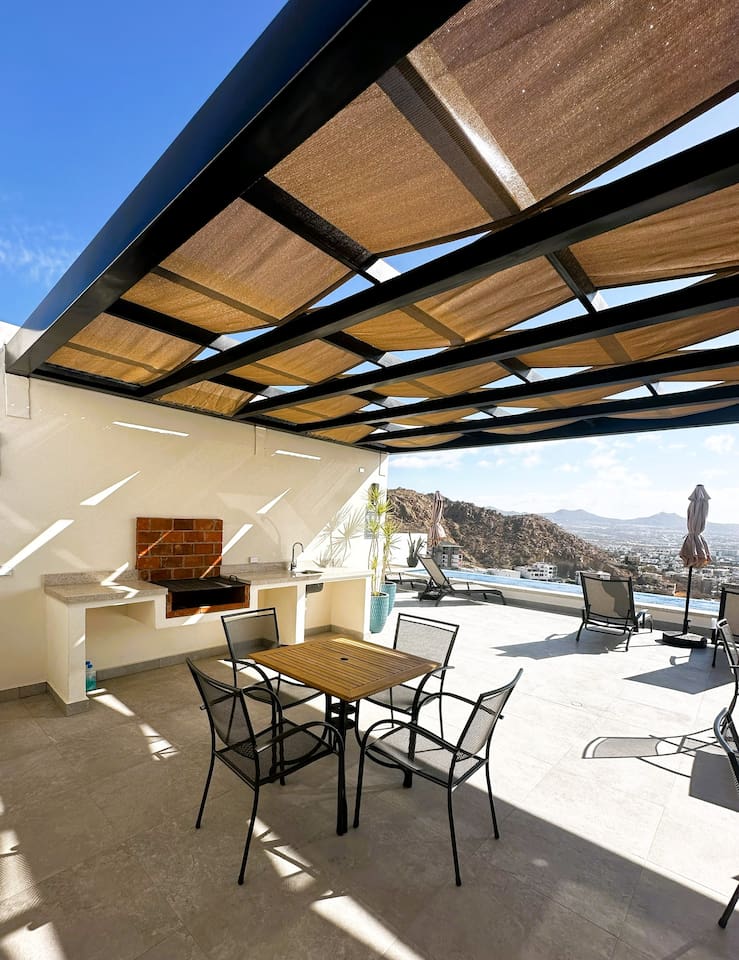 Outdoor kitchen and dining.