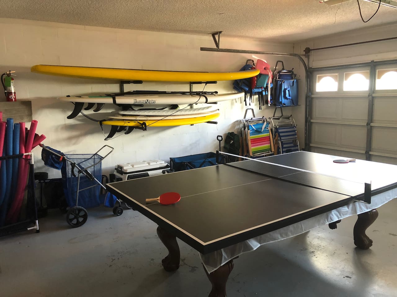Everything needed for a day at the beach! We provide towels, coolers, chairs, paddle, and boogie boards, floats and more! Rainy day? Staycation with pool/ping pong, board games,  and darts! 