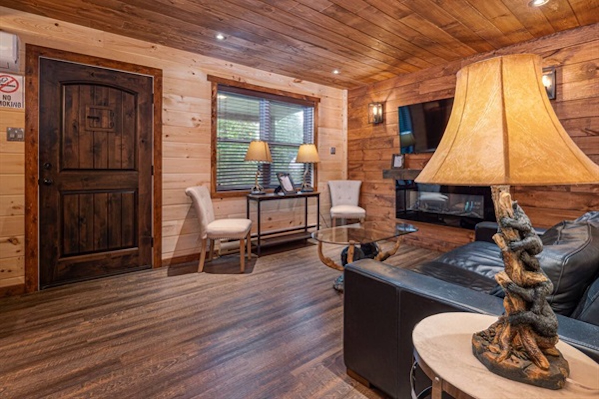 Cozy living area with warm lighting and rustic cottage decor