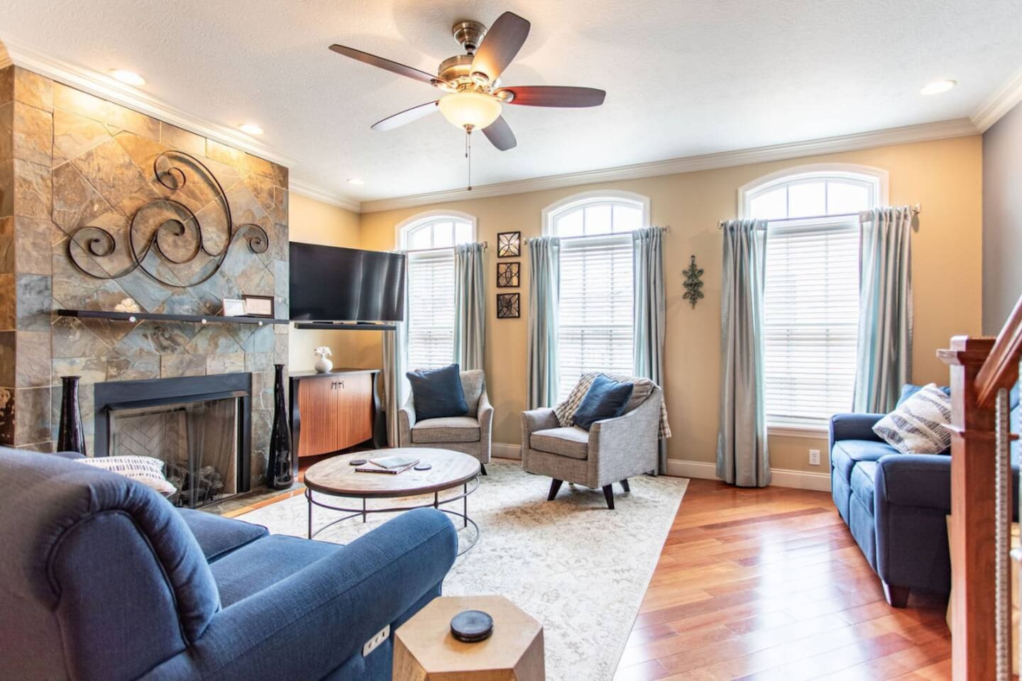 Cozy living area with large windows that flood the space with natural light, creating a bright and inviting atmosphere for relaxation.