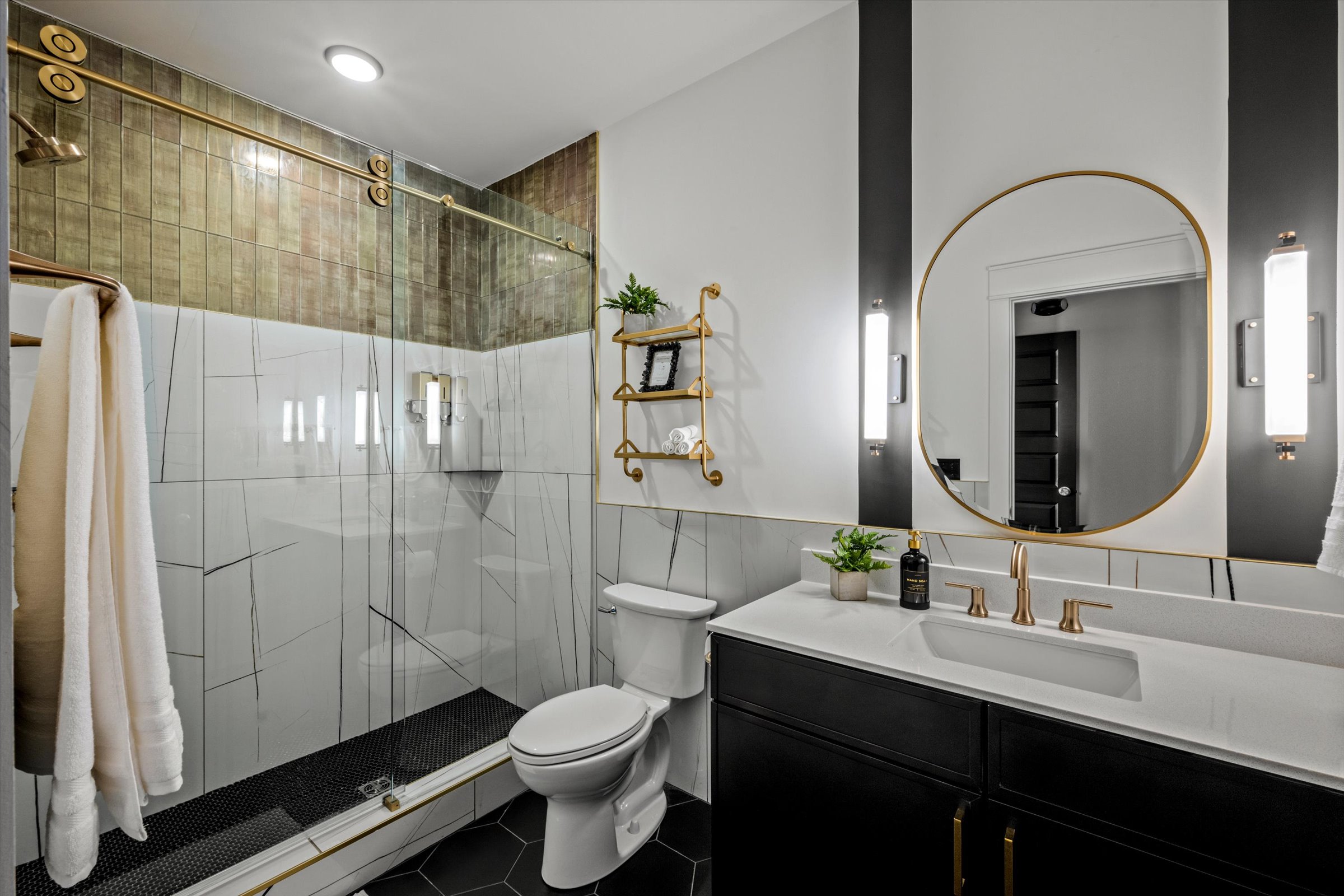 Unwind in your private en-suite sanctuary, complete with a refreshing walk-in shower designed for ultimate comfort and accessibility! 