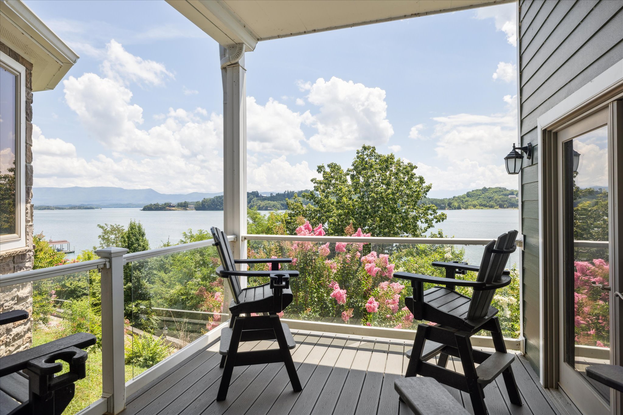 Covered Deck overlooking English Mountain, accessed doors in from the Living Room or the Kitchen 