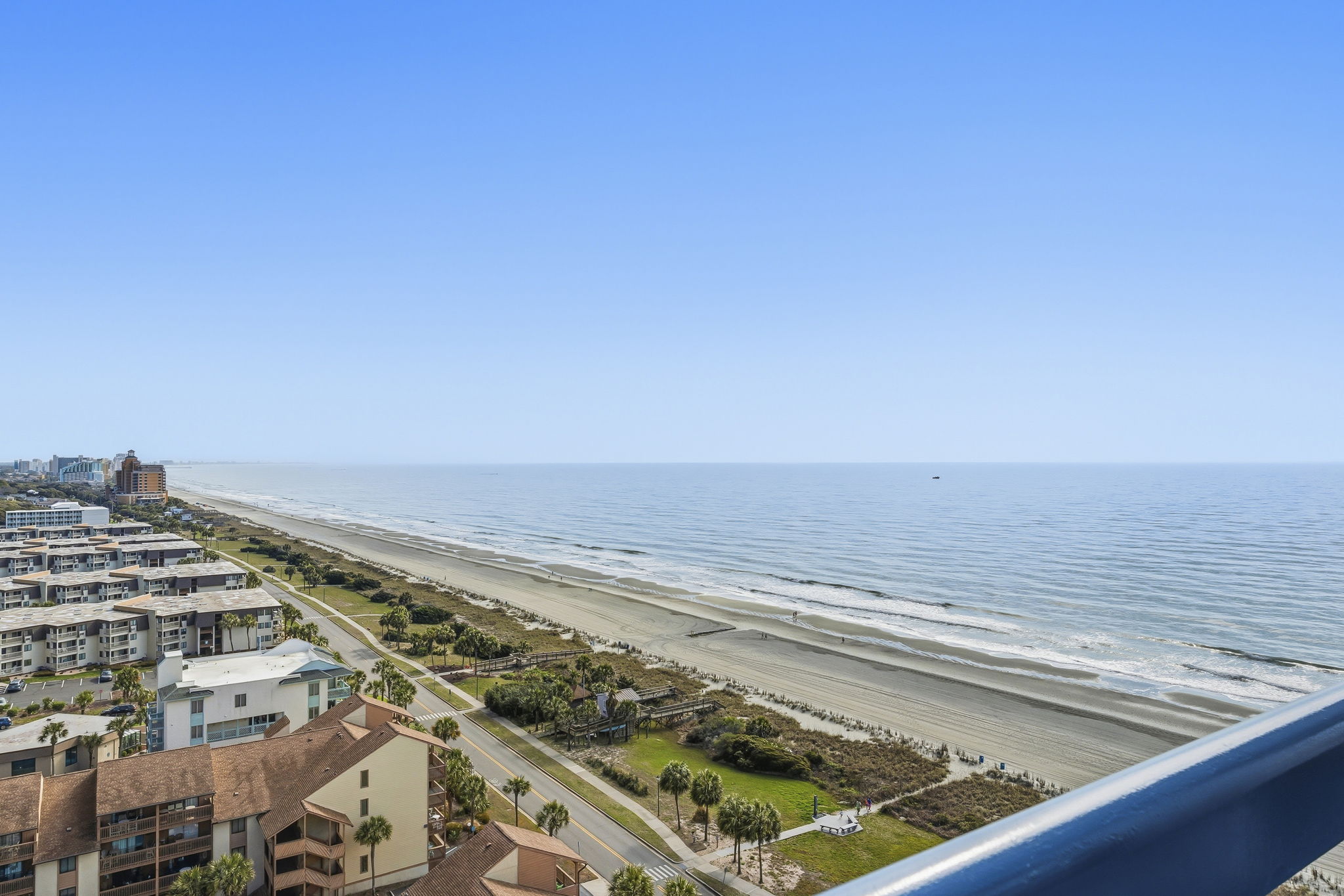 Elevated 17th-floor view of the beach and shoreline