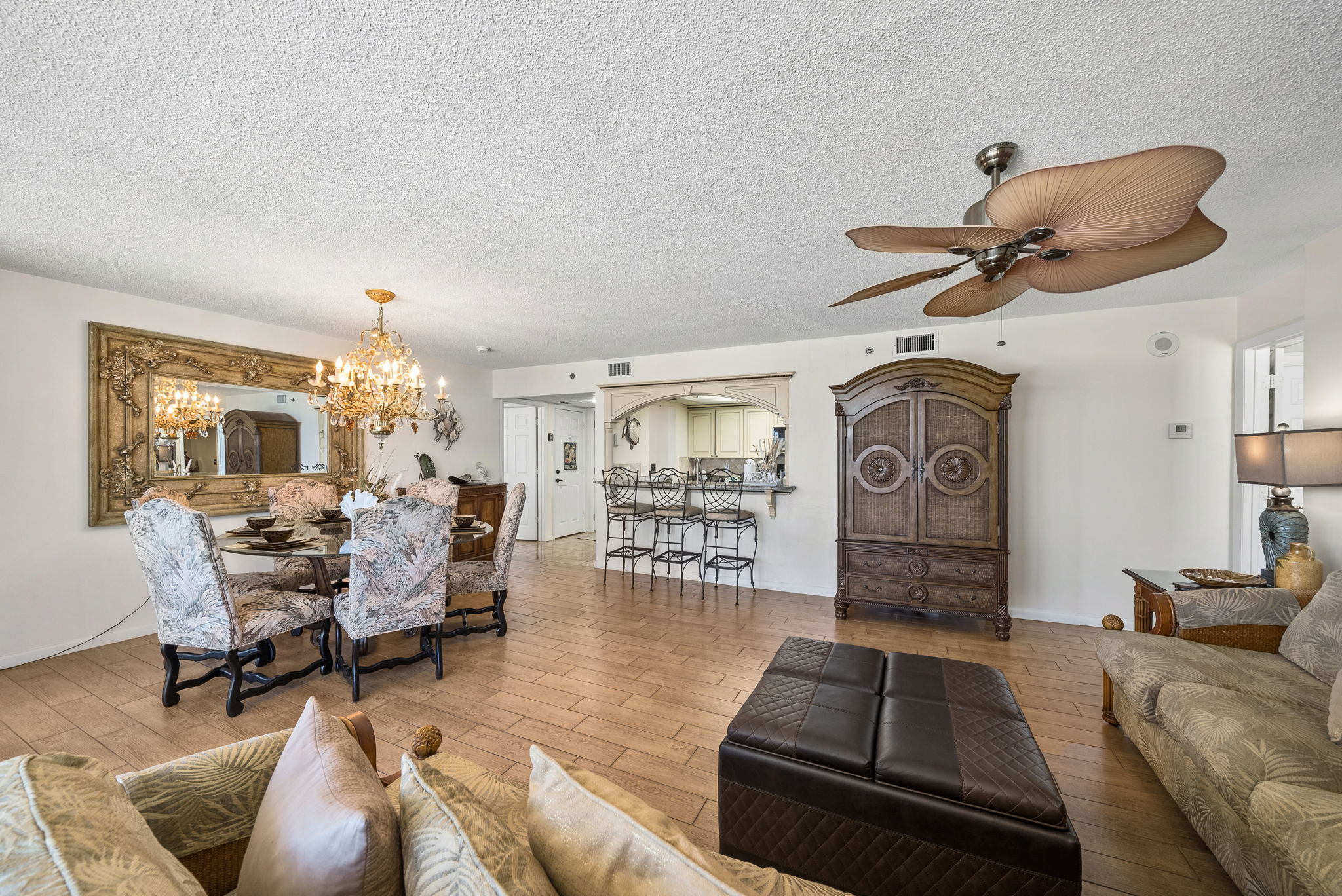 View of kitchen and dining area from the sectional sofa