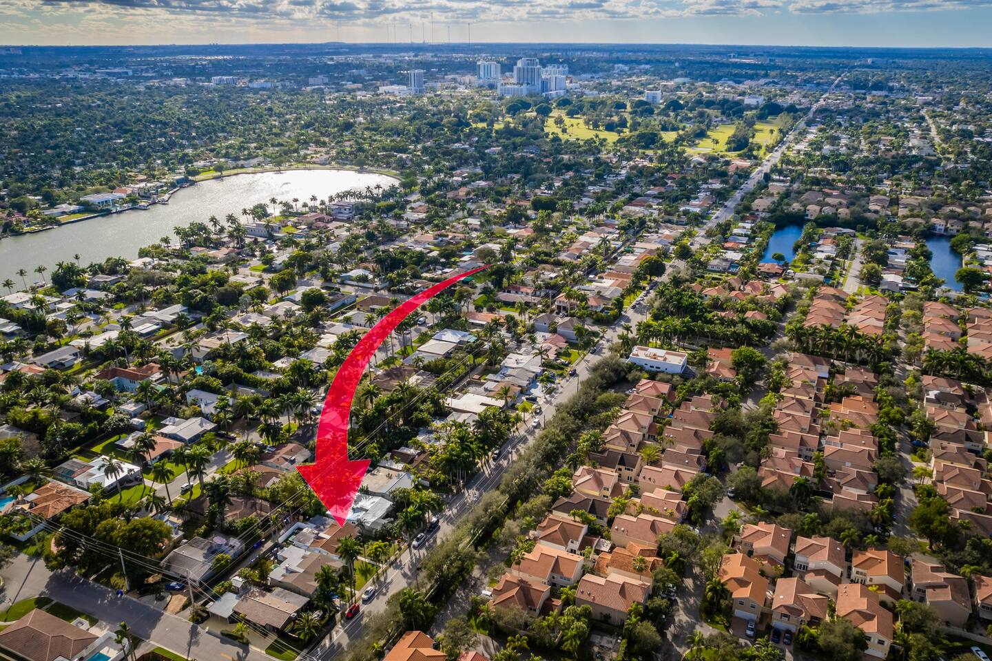 Just a 5 minute walk to Hollywood Beach Boardwalk is this lovely Bungalow tucked in a safe family-friendly neighborhood