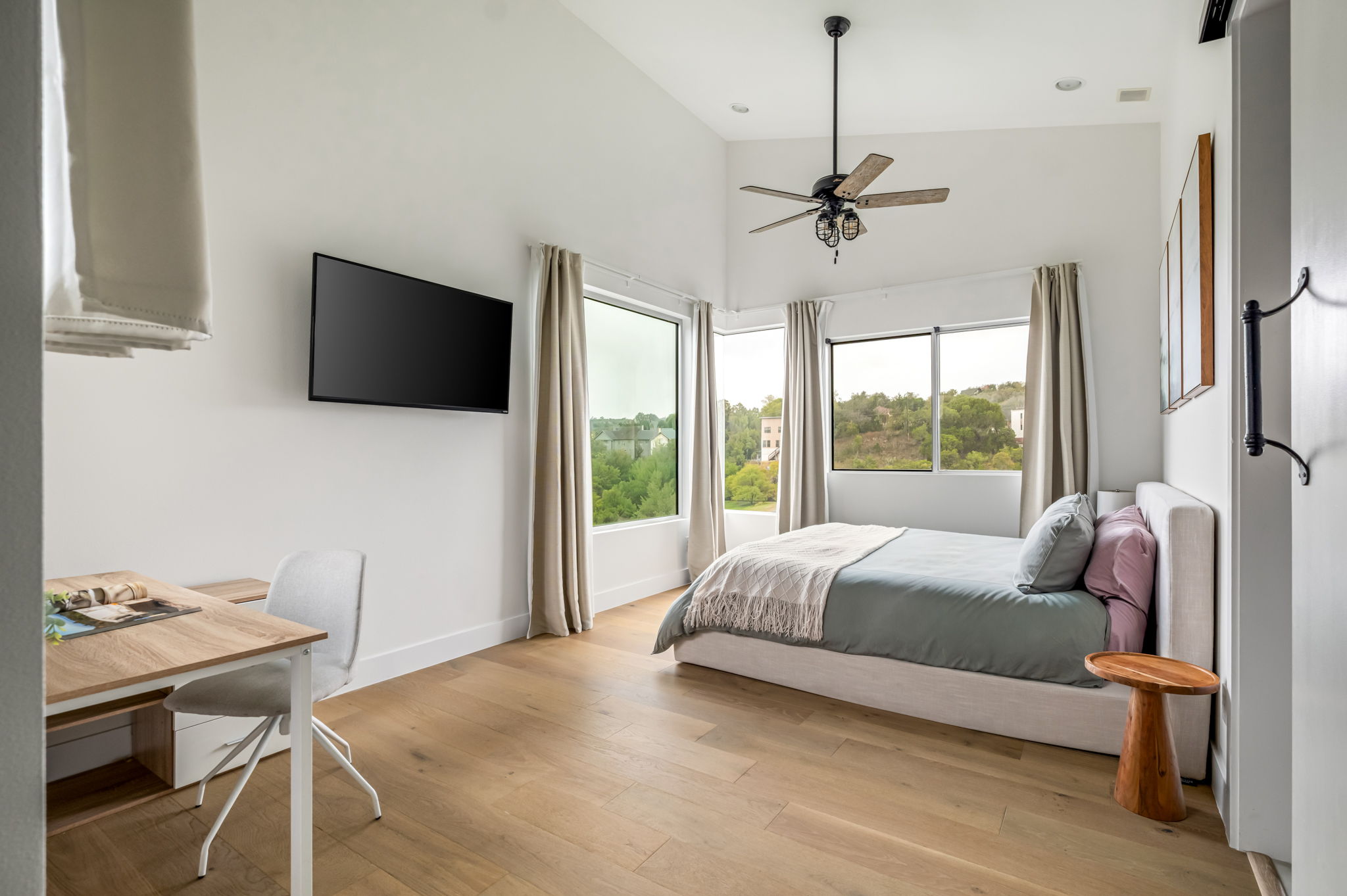 Peaceful primary bedroom with king bed and relaxing views