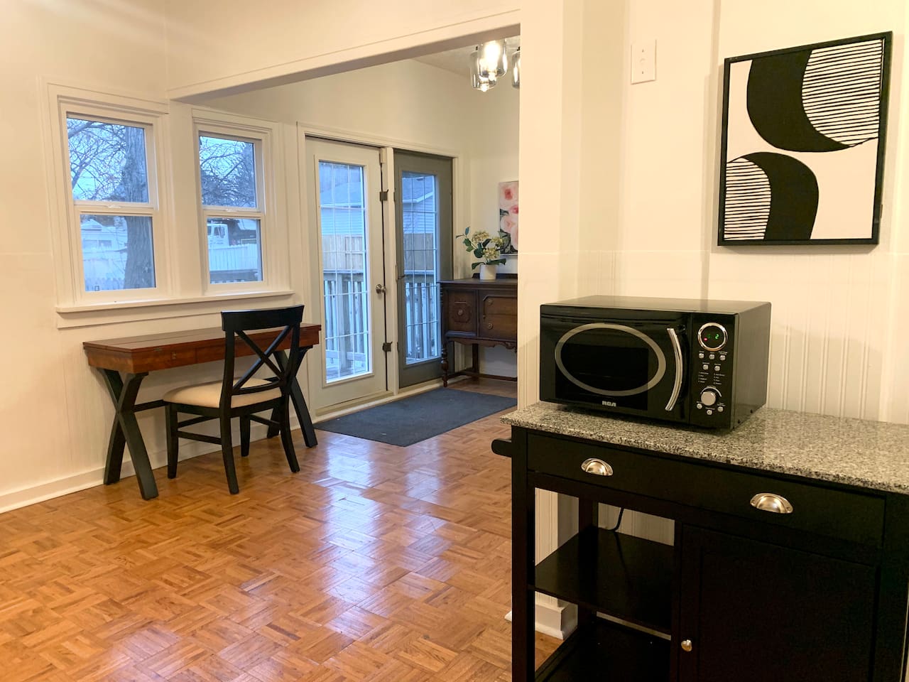 A table and chair that works well as a desk. The table expands to allow a larger workspace, if needed. 
