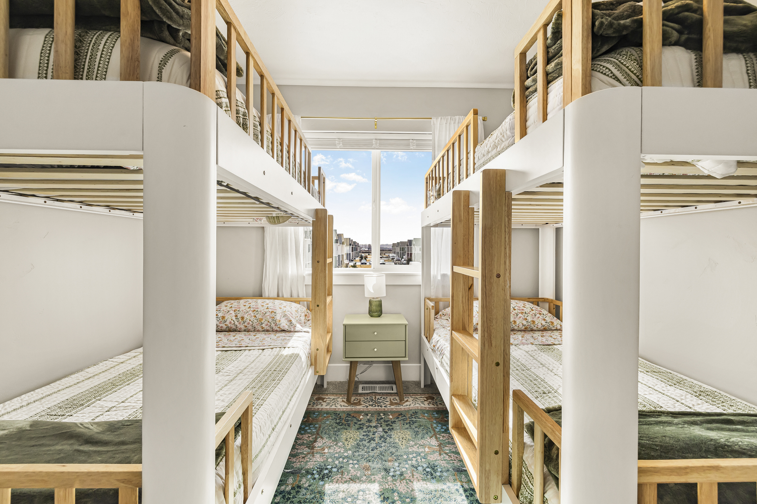 Third bedroom with two bunk beds, perfect for families or children.